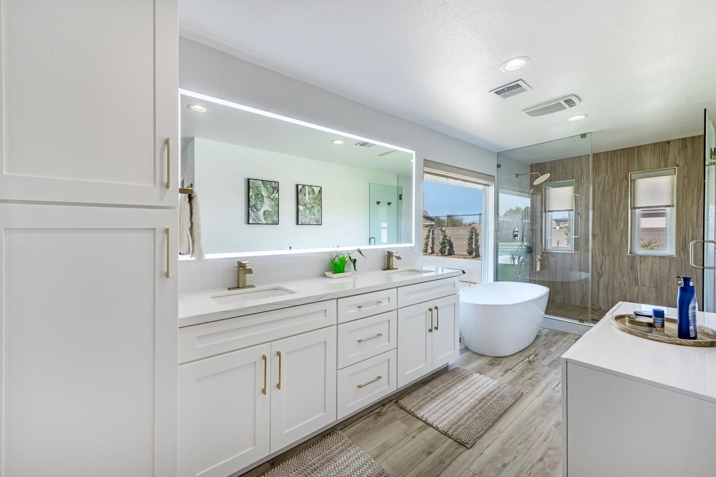 Natural light, clean lines, and warm materials bring a quiet sense of balance to this primary bath.
A freestanding tub, glass shower enclosure, and custom cabinetry work together to create a space that feels both open and intentionally designed.
Projects like this reflect the kind of bathroom remodeling in Las Vegas that prioritizes thoughtful design, careful planning, and craftsmanship that holds up for years to come.
#NewFreedomProperties #BathroomRemodelLasVegas #DesertLiving