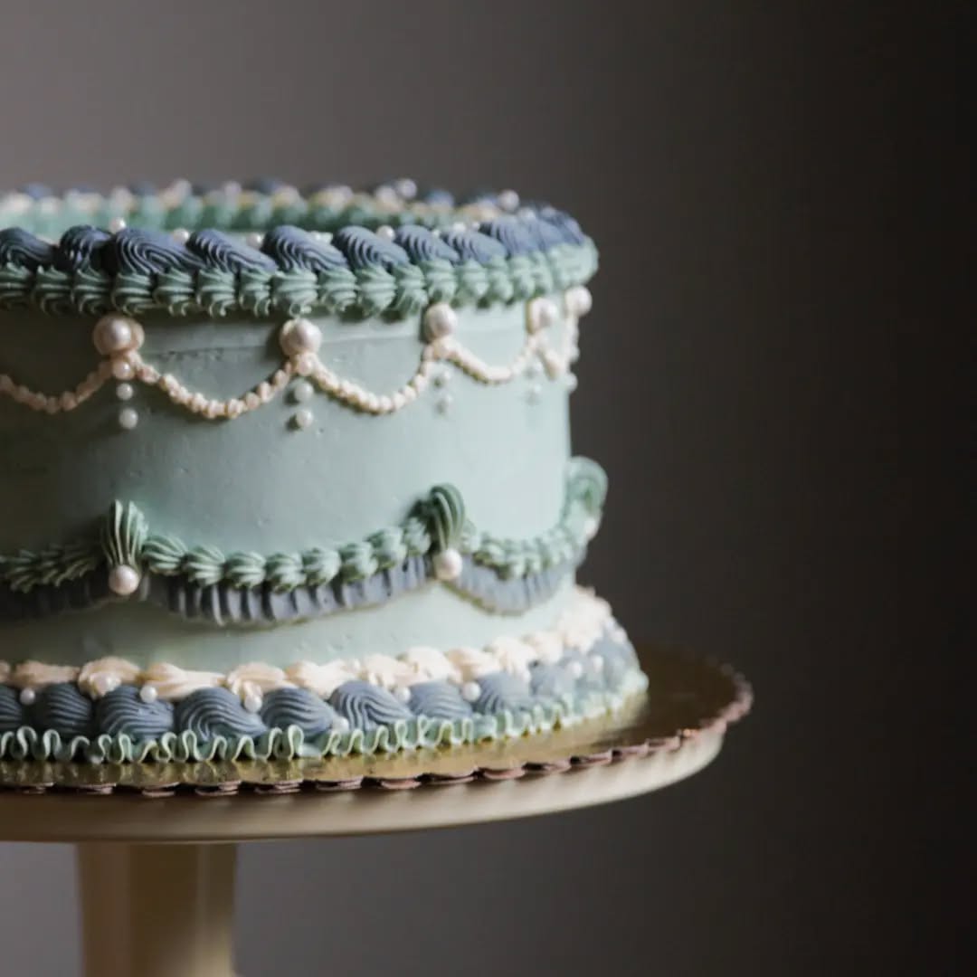 It's not heart-shaped, but it's certainly vintage! I've always loved buttercream piping and especially for people's celebrations. This vintage trend can stick around as long as it wants to, and maybe longer. 😁
This red velvet cake features vanilla Swiss meringue buttercream with white, sage green, and a darker green piping. Plus, sugar pearl sprinkles in multiple sizes...further proof in my sprinkle-minded head that having lots of sprinkles on hand at all times is never a bad idea.
Thank you to my customers for choosing Blue Canary Bakery for your birthdays, showers, weddings, and more! And with Mother's Day just around the corner, please check out our shop page, send in a quote requesr, or email us 📧: info@bluecanarybakery.com.
#vintagecake #vintagestyle #cakedecorator #cakestagram #cakesofinstagram #vintagecakes #buttercream #buttercreamcake #birthdaycake #elegantcake #mothersdaycake #mothersday2024 #twincitiesbaker #twincities #twincitiesbakery #twincitiesbusiness #localbusiness #localbaker #sprinkles #bluecanarybakery #prettycakes #stpaul #mpls #minnstagram #minneapolis #stp #mn