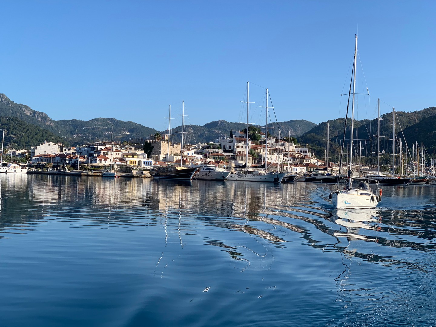 Marmaris — where turquoise bays meet world-class sailing. ⛵️✨
Located on Turkey’s southwestern coast, Marmaris is renowned for its turquoise bays, natural beauty, and strong sailing culture. Situated between the Mediterranean and Aegean Seas, it offers ideal wind conditions, wide sailing areas, and modern marinas—making it a top destination for both yacht charters and international regattas.
The Ultimate Yacht Charter Experience
Marmaris and its surroundings feature some of Turkey’s finest blue cruise routes. Guests can explore:
The untouched coves of Datça Peninsula
The windy waters of Hisarönü Gulf
The peaceful charm of Bozburun and Selimiye
The iconic bays of Göcek and Fethiye
This diversity ensures a safe and enjoyable experience for both experienced sailors and first-time guests.
A Hub for International Sailing Races
Marmaris is also a leading venue for sailing competitions, thanks to its consistent winds and ideal race conditions. Each year, sailors from around the world gather here, especially in spring and autumn.
A key driver behind this success is the Marmaris International Yacht Club, organizer of major events such as the prestigious Marmaris International Race Week—one of Europe’s top regattas.
The Perfect Balance of Holiday & Sport
Marmaris uniquely combines leisure and performance sailing—offering turquoise bays, charming coastal towns, and dynamic racecourses in one destination.
Discover Marmaris by Sail
Whether for a relaxing yacht holiday or competitive racing, Marmaris delivers an inspiring experience for all levels—where sea, wind, and sailing come together.
For the full article, please visit our website.
#Marmaris #YachtCharter #SailingAdventures #BlueVoyage #Turkey #Regatta #SailingLife #BoatLife #TravelInspiration