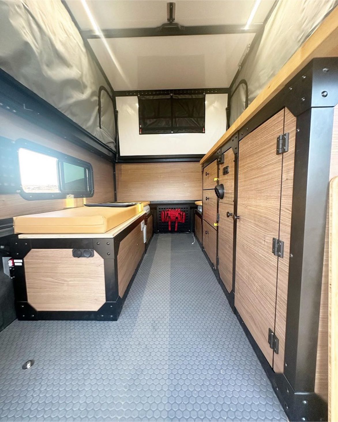 Pretty sweet to have contributed to this awesome build. Canvas, bed, window covers, gear loft, and cushions. #sanjuansewing #howerbuilt #durangocolorado
Reposted from @HowerBuilt- Loving the custom buildout for this 8 foot beast. Two fridge system. Tons of storage and seating/cooking room! Videos coming soon of the whole buildout.