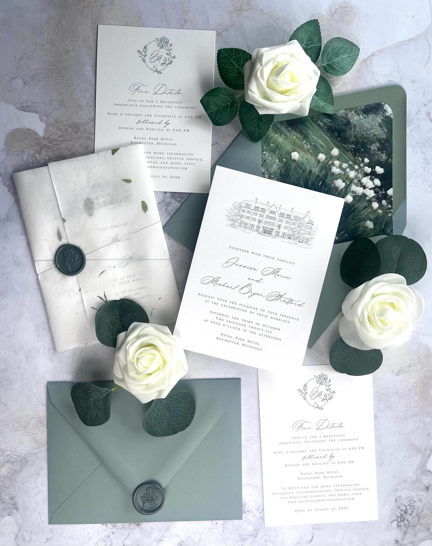 Handmade rice paper wraps around the invitation, soft and textured in the most delicate way. It is tied with embroidery thread and finished with a natural green wax seal, simple but so intentional.
Inside, a hand drawn sketch of the Royal Park Hotel brings everything back to place. Dusty sage and warm ivory keep the palette soft and romantic, while the typography balances classic and modern just right.
It is thoughtful, natural, and truly one of a kind.
If you are ready to create your own dream invitations, start at papermuse.co or order a sample pack to see everything in person.