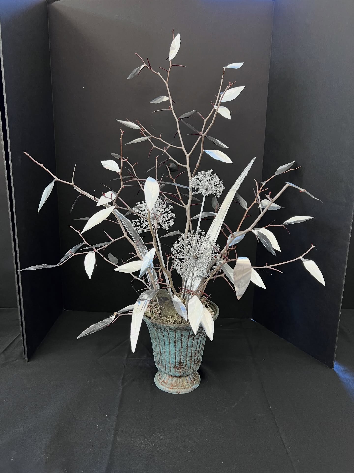 Shiny, shimmering, and oh-so-chic! ✨ For our March 5th flower design practice, we challenged our members to “Put a Little Glitz in Your Life” by creating stunning metallic arrangements.
The requirement was to go bold and try for at least 60% of the display featuring a metallic element—whether through polished containers or creatively painted foliage. From sleek silver vessels to foil leaves that caught every bit of light, the results were absolutely dazzling. It’s amazing how a little luster can completely transform a bouquet!
Swipe to see these brilliant, member-made displays from different angles.
#gardenclub #gardenclubofwiscasset #wiscasset #floraldesign #mainegardeners