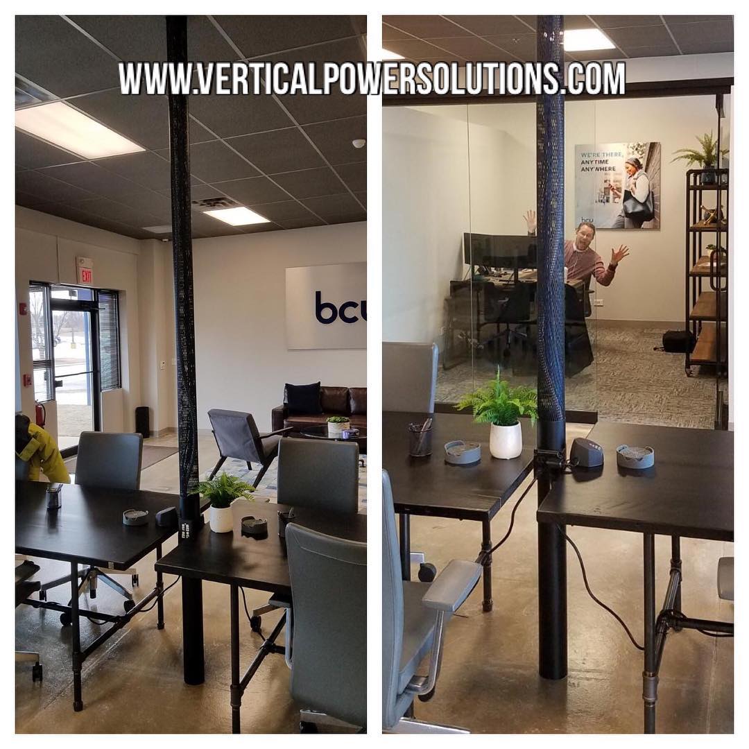 Custom made matte black power pole for bcu in Naperville, IL. #workstation #deskheight #office design #openofficedesign #cubicledecor