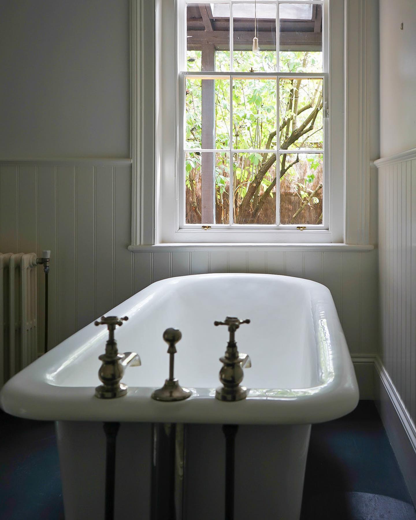 When we bought the Old Rectory there was only one bathroom on the ground floor of the house (and one under the roofline which, along with a bedroom, we removed).
Swipe left to see what has become of the old bathroom: it’s now the David Unaipon bedroom, with an adjoining ensuite bath room (but with a shower in place of a bath). We also added another sash window in the bedroom to provide better light and views to the fernery.
All three bedrooms now have ensuite bath rooms (all with showers, not baths). We think the Reverend James Sullivan, appointed to the Cure of Kyneton and Mt Macedon in 1851, would be impressed!
The Old Rectory, circa 1850, is listed by the @nationaltrustvic
Booking enquiries may be made via @airbnb or our website.
Artwork by local artist Sarah Gabriel of @lauristonpress
All our bed linen is made in Australia by @abode_living
@visitmacedonranges
@daylesfordmacedonranges
@piperstkyneton
#kyneton
#oldrectory
#kynetonluxury
#countrylife
#onlyanhourfrommelbourne
#heritageaccommodation
#australiancolonialarchitecture
#castironbath
#fernery
#pteridomania