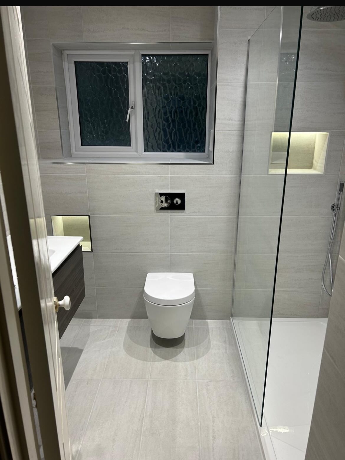 Another bathroom completed by our man Nick! 💙
From the clean feel of the stone tiles to the warm of the dark oak vanity unit, illuminated with warm accent lights - this bathroom has a beautiful calming presence set to stand the test of time ✨
This bathroom used the following products:
🇮🇪Merlyn’s Touchstone tray and Wetroom glass
🇬🇧 Vado’s lovely high-shine anti-limescale shower kit 🚿
🇦🇪RAK Ceramics Joy vanity unit in Moka Walnut paired with the Resort wall hung pan 🪵
🇩🇪Viega’s Prevista WC frame and concealed cistern 💪🏻
🇪🇺JIS Europe’s stainless steel Beacon towel warmer to bring the heat! ♨️
🇬🇧HiB’s Ambience Back-lit mirror with colour changing LED’s and demister pad ✨
🏴 St James England’s wonderful Abbey basin mixer - brilliant on low pressure systems! 🚰
@vado_uk @hib_bathrooms @rakceramicsuk @viega_uk @jiseuropeltd @stjamesengland @merlynshowering
#bathroomsofinstagram #luxuryhomes #interiors #showers #renovation