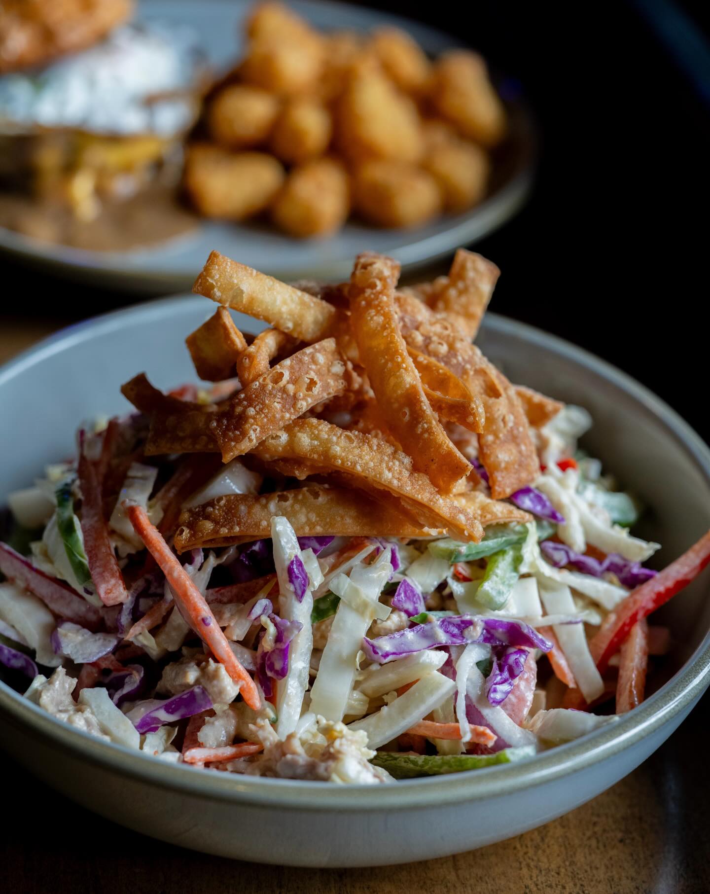 Asian Chicken Salad | napa cabbage, red cabbage, carrots, onions, bell peppers, cucumber, fuji apples, crispy wontons, marinated chicken, creamy sesame ginger dressing
#seattleeats #seattlefoodie #seattlebar #seattlerestaurants #magnoliaseattle