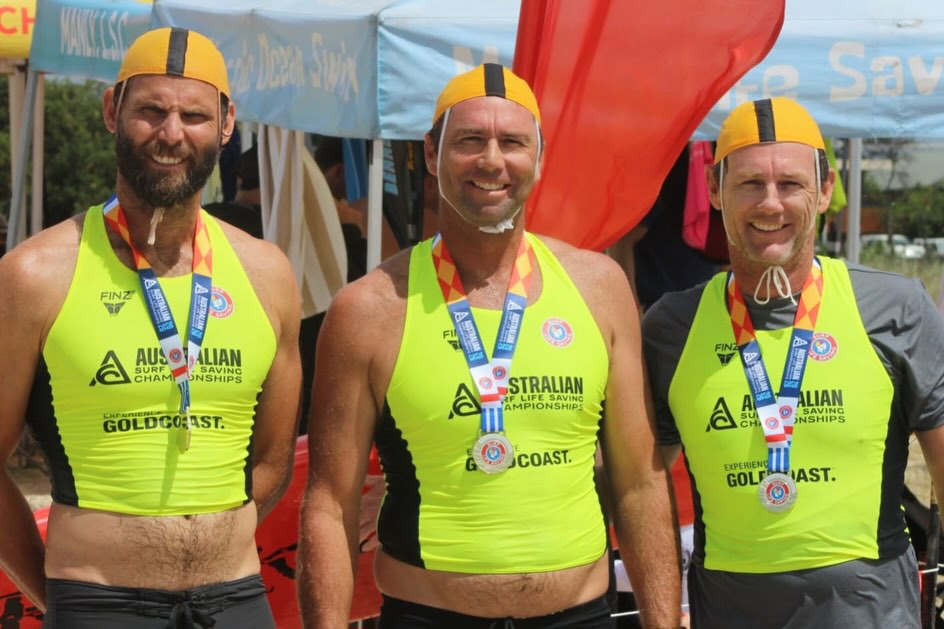 Not to be outdone by the outstanding efforts of our youth team at #aussies2026 our Masters team had a very successful 2 days of competition.
There were gold medals to Alan Dunne and Joe Dougherty in the 40-44 years Board Rescue, and Alan, Joe and Hugh Dougherty in the 110+ years Board Relay. Silver to the same trio in the 110+ years surf teams and bronze medals to Alan, Hugh and Justin Dean in the 130+ years Taplin Relay. More bronze medals were won by Michael Stubbs and Pete Rheinberger in the 60-64 Board Rescue, Michael, Pete and Michael Miller in the 190+ Surf teams, Dave O’Brien, Paul Davis and Dave Fleming in the 170+ surf teams and Bobbie Winger in the 70-74 Surf race.
Well done to all out Masters on a fantastic 2 days and best of luck to those in the board riding this week and our March Past team on Sunday. #yamba