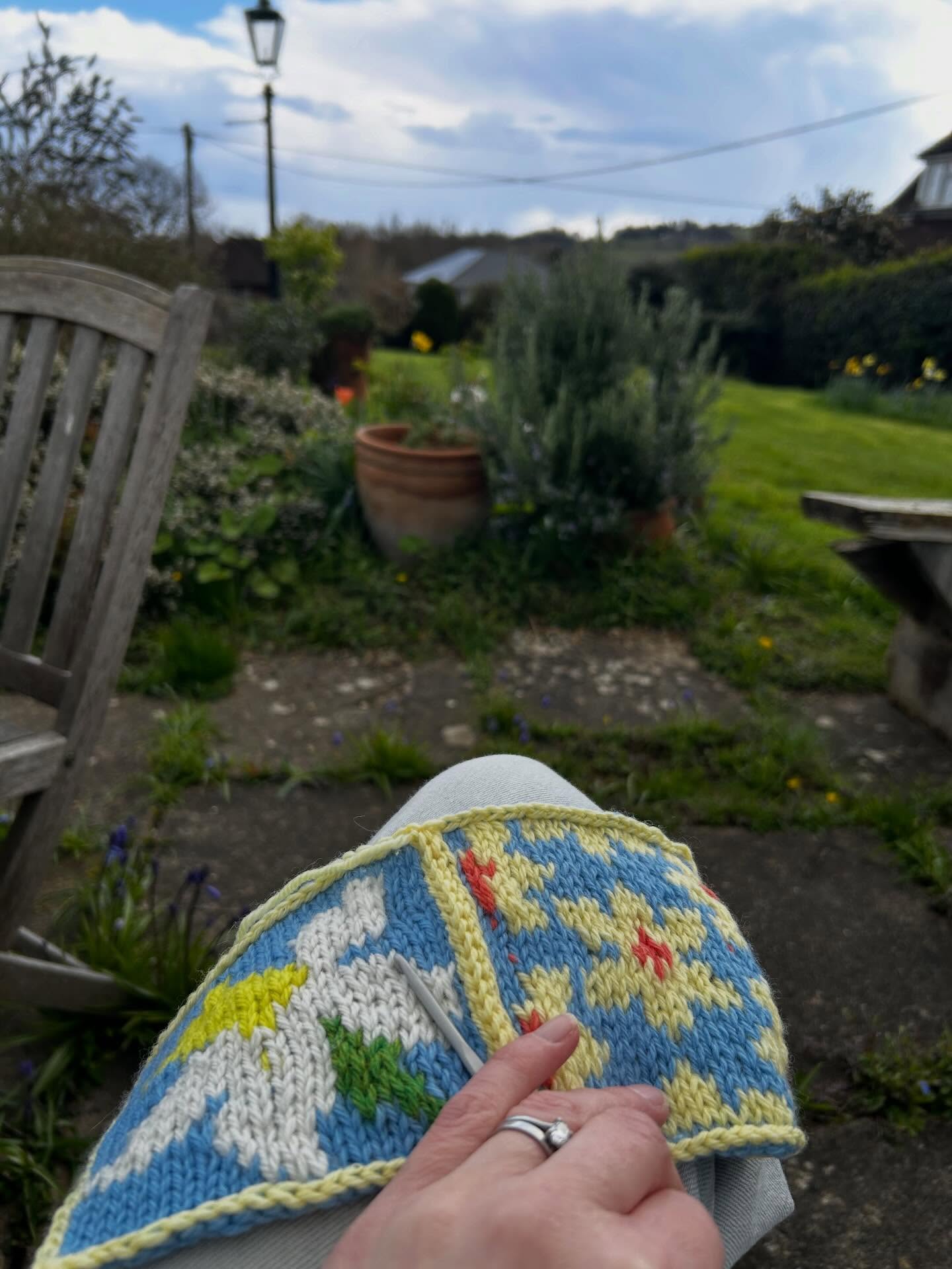 Crocheting together my #yearbypiece2025 square for March in the Spring sunshine ☀️ 🌼🐩