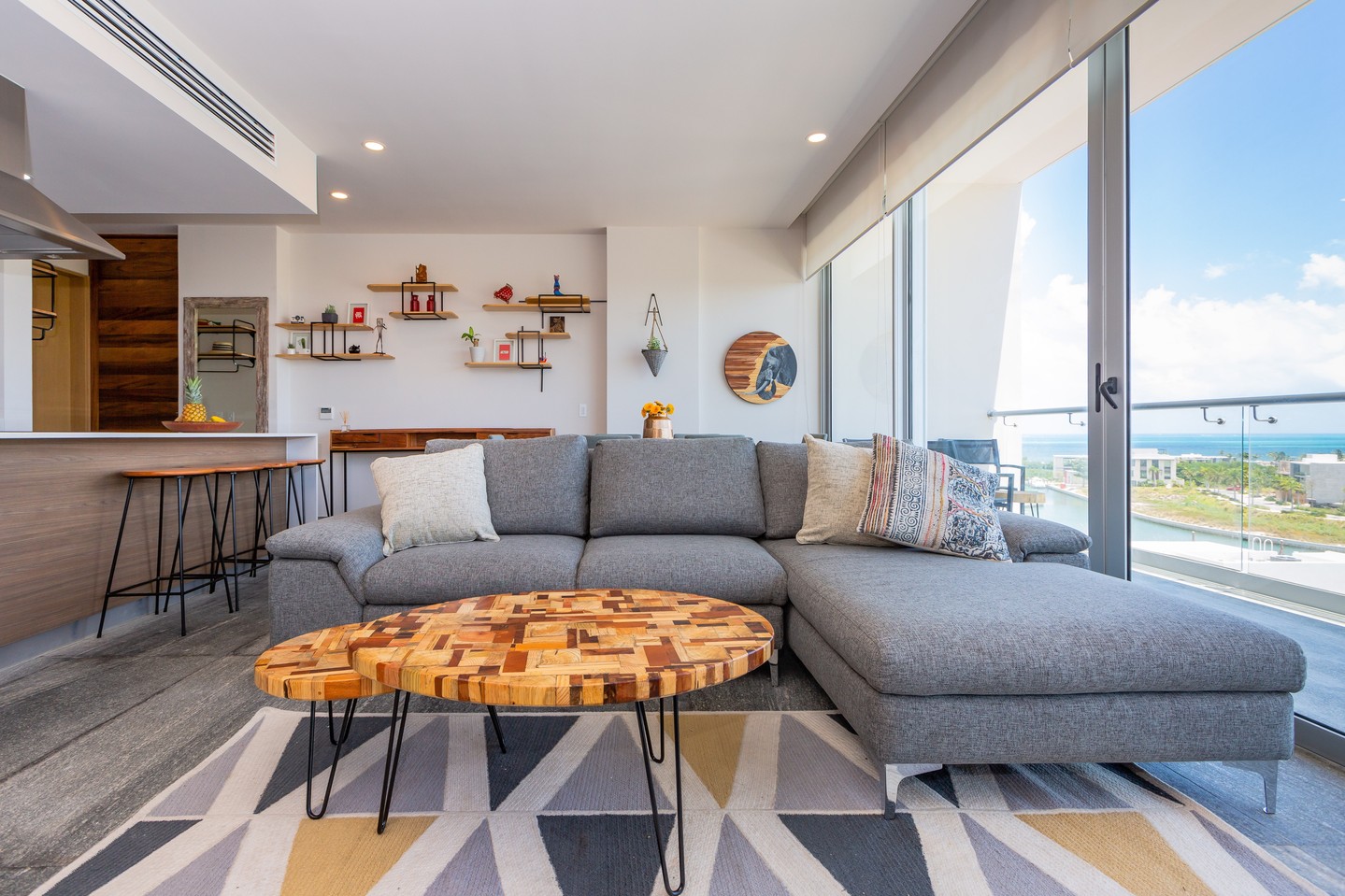Artisanal reclaimed wood furniture set by Studio Oryx, serving as a sculptural centerpiece for a Luxury Condo Interior Design project in the Riviera Maya.
#studioryx #puertocancun #luxurycancun #luxurymexico #interiordesign