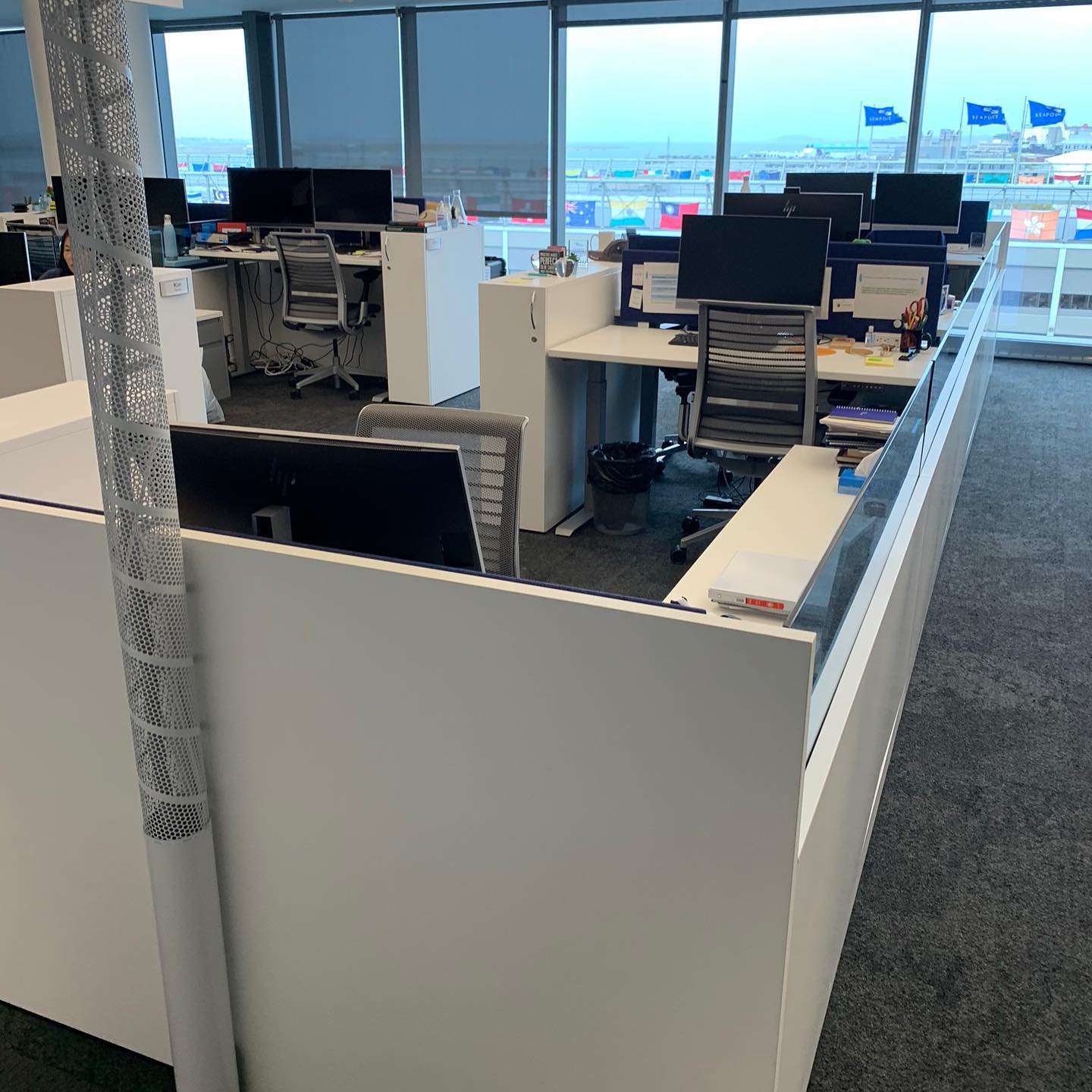Round Spiral Perf. Riser with custom 24 inch partial hard lid base in gloss white. #workstation #openoffice #deskdecor #powerdata