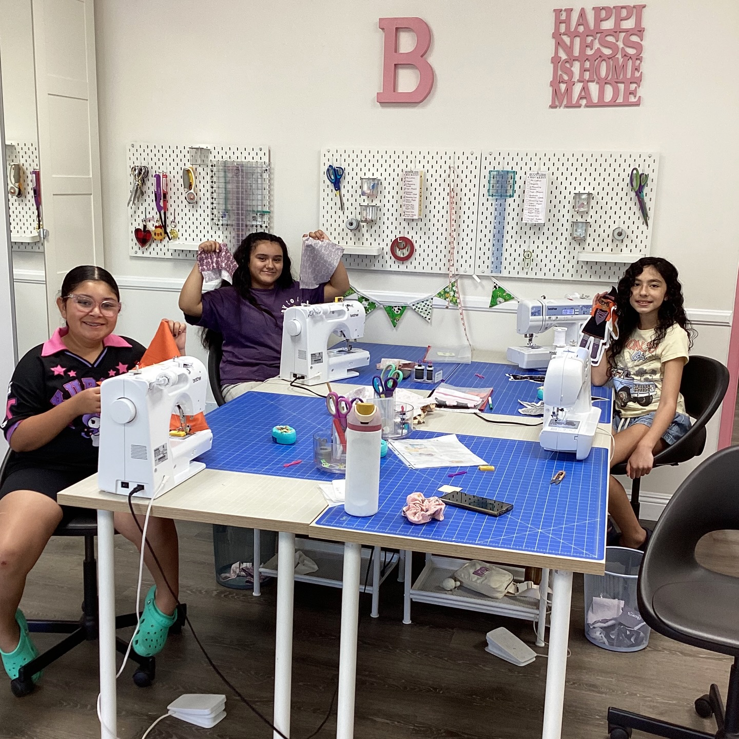 Crafting, creating, and making friends. Sewing class joy in action! Bumblebunch in Rancho Cucamonga offers sewing classes for ages 9-17. Join the fun at www.bumblebunch.com.