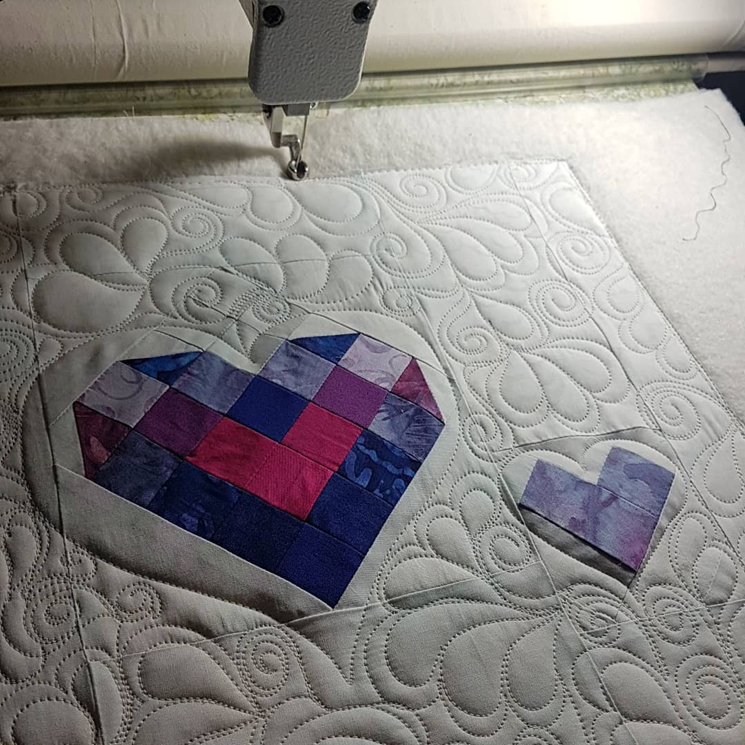 I was recently asked to quilt a memorial quilt that had been made by a group of ladies to give to a woman in their group whos husband had passed. There were nine different heart blocks in the quilt so I decided to dust off my free motion quilting skills and quilt each block with a different pattern. I know I took pictures of each block but for some reason I'm only able to find seven pictures. My apologies to those whos blocks I've missed. I really loved the opportunity to let my free motion creativity flow ❤
#quiltingismypassion #freemotionquilting #longarmquilter #quiltersinvictoriabc #quiltersofinstagram #canadianquilter #cancersucks #heartquilt
