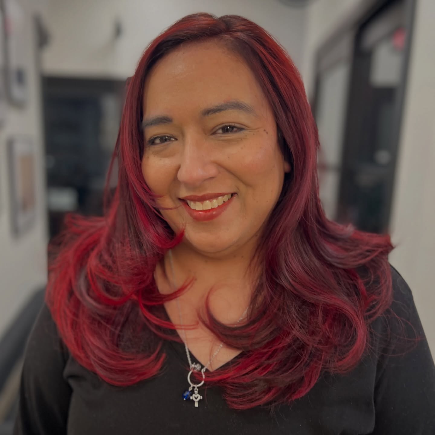 We talk a lot about low maintenance color, and this is a PERFECT example of a high maintenance vibe (VIVID 🔥🔥🔥 RED) mixed in with a regular grey coverage base color.
Danielle gets new highlights added about once a year and glazed with vivid red… in between appointments she can use a color conditioner or let it fade to a calmer red.
Either way the grey get covered and she has plenty of dimension!
This is one of the best ways to play with your color without being super committed to any ONE color entirely.
Would you try the bright red 🔥 or would you like the dimension, but calmer red ❤️??
Hair by @hairgeniusamanda