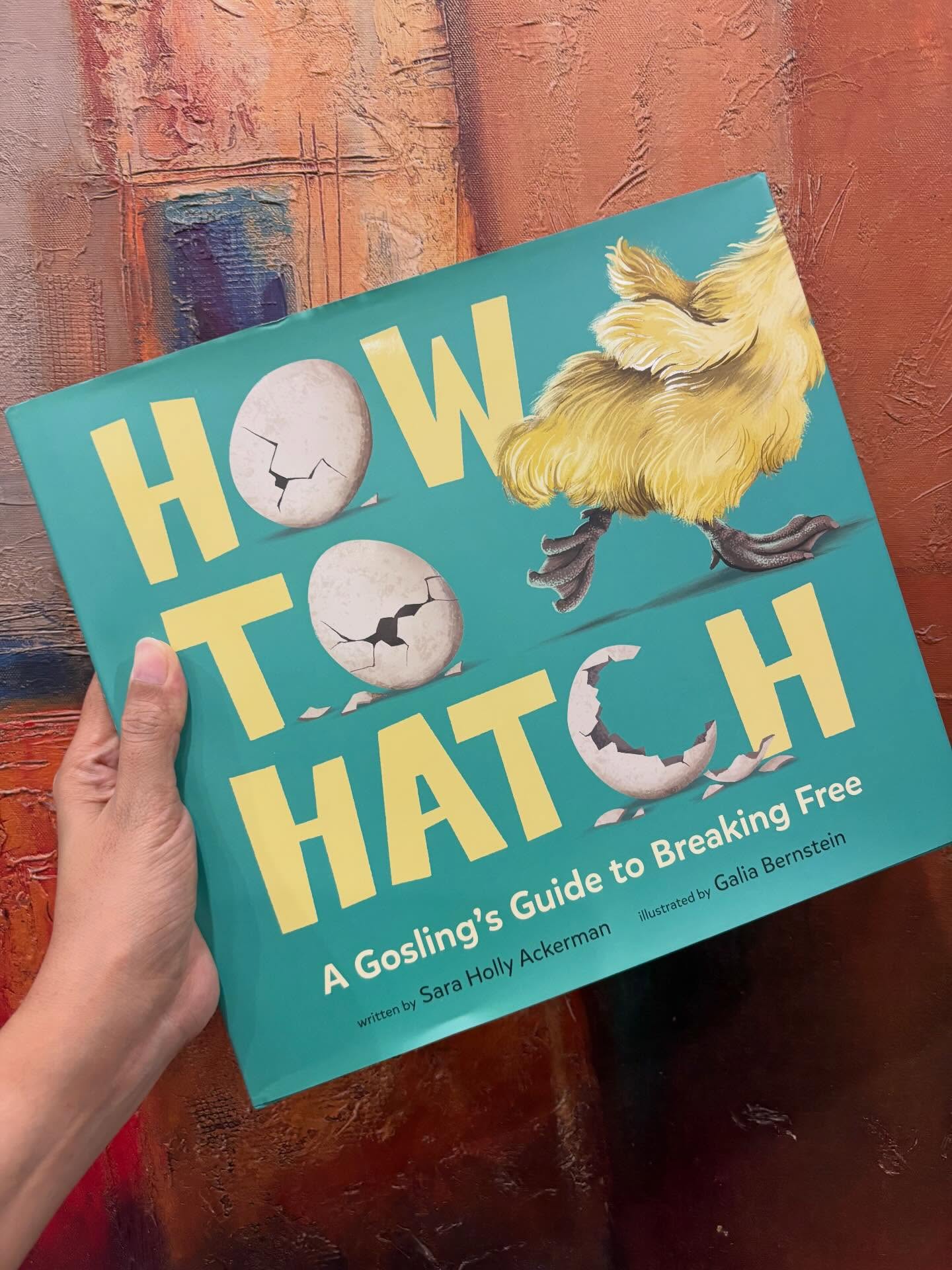 The story follows a gosling as it works its way out of its shell, speaking to it in a calm and encouraging way. It talks about how tight the space is and gently guides the gosling to breathe, tap, and rest whenever it needs to. Along the side, there are simple notes explaining what is really happening inside the shell as it changes from a safe space to one that feels too small.
Each double-page spread is filled with big, eye-catching illustrations showing the gosling struggling, stretching, and trying to find its balance. In the end, it finally breaks free and joins its soft yellow siblings, following their mother together.
This is a rare blend of narrative non-fiction and a “how-to” guide. Grades 1 and above will love everything about it!
#howtohatch #kidlit #picturebook #readlikeawolfeats #mitrasuggests