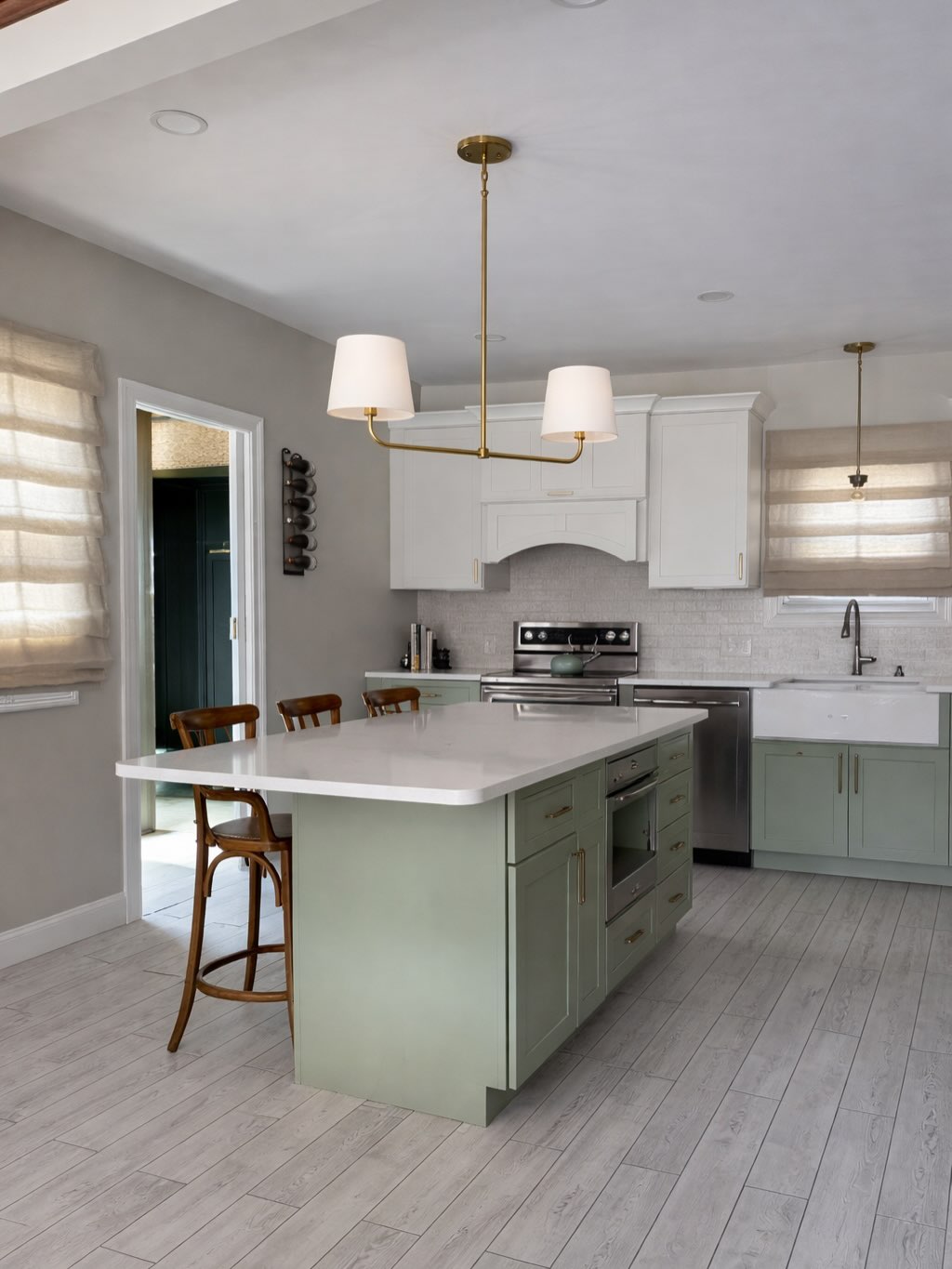 The kitchen in the early 1900’s home I’ve been working on is finally complete! I have a confession though, the new light fixture wasn’t installed in time for me to take photos, so I edited it in. Second picture shows the light that was there…and don’t miss the before picture (that yellow tile was certainly a choice). Good news is - the new fixture is now up and I’ll be back to work on some new projects in the future, so I’ll be able to get some actual finished project photos of the kitchen.
Also peek that moody green from the office that we carried over to the mudroom cabinets.
.
#interiordesigndetails #millenialgreenisheretostay #modernclassickitchen #kitchenrenovations #twopagescurtains