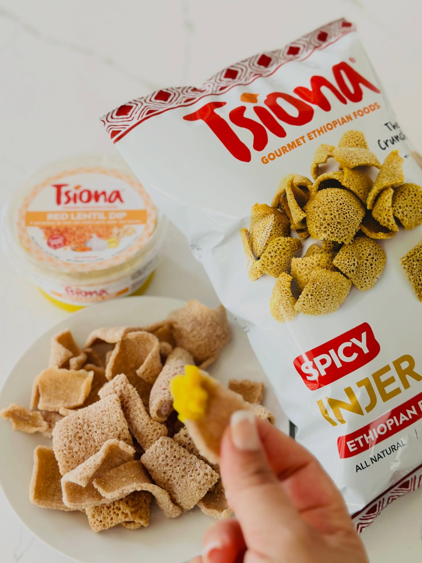 The perfect TSOM option!! Find our @tsionafoods Injera Crisps at your favorite local @wholefoods @momsorganicmarket and many of your favorite Ethiopian/Eritrean Markets
#injeracrisps #tsionafoodscrisps #injera #tsionafoodsproducts #habesha enebla crunchysnacks