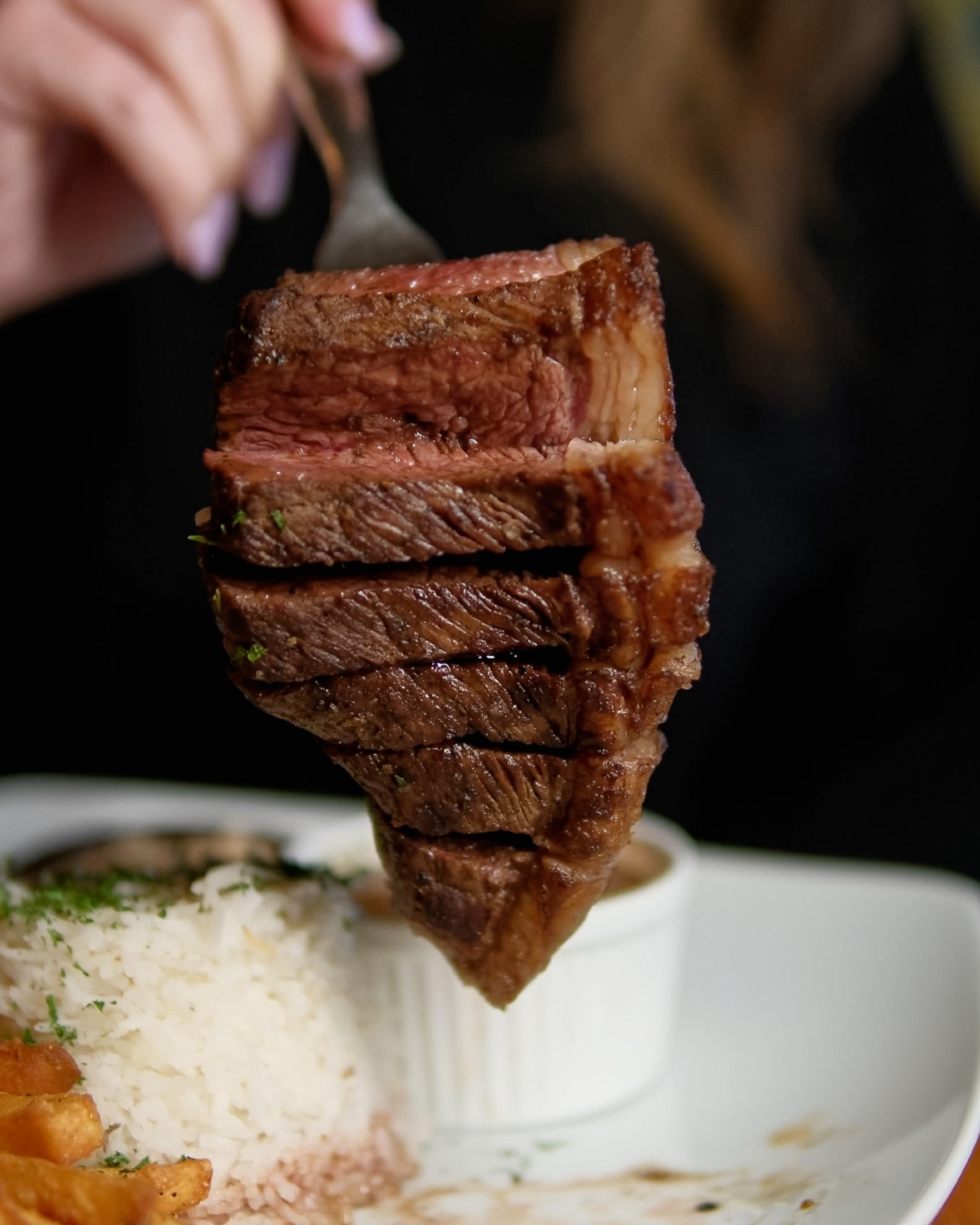 PICANHA — Brazilian steak.
This is 8oz of a special Brazilian cut of top sirloin steak, seasoned with sea salt, and served with basmati rice, brown beans, crispy fries, farofa (toasted cassava flour with bacon) & vinaigrette salsa.