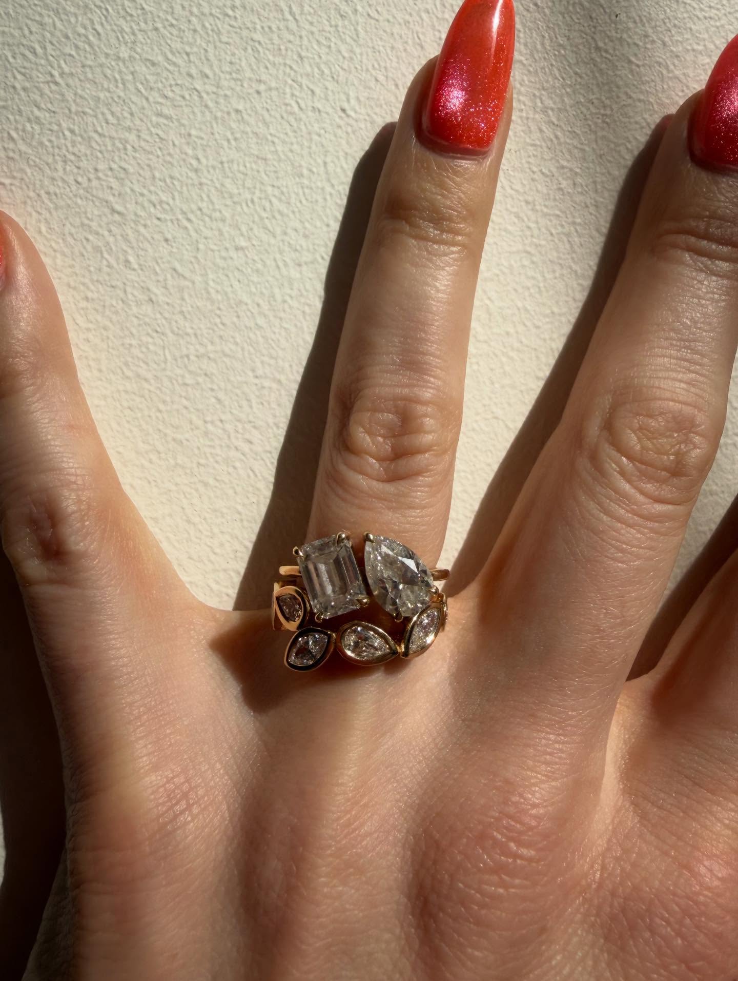 I love making things with metal. That’s the story of my work these days for awhile now. And a lot of the time I get to work with people at pretty significant times of their life. They’ve found someone that matches them, and makes them feel like together they can accomplish the things that make a good fun life. ❤️ Whatever that is for them, they feel it. ✨
In these pieces I got to work with two beautiful individuals where when you’re in their presence it just makes you feel good, like reassured about the world we are in. 🌀 You can feel their love and remember it’s what makes everything we do worth it. ❤️
I first got to work with Primo who’s a truly talented artist and we created an engagement ring for him to give her. He knew just what she’d like and we brought it to life. A stunner of a Toi and Moi ring- a You and Me forever ring. And then together with Caroline, we created a stuntin stunner of a wedding band to ride along with it. A crew of marquis and pear cuts set in gold to mirror the shape of her engagement ring, and subtly nestled around which looks to me like the symbols of all the things that come on their path of life. The significant moments and seasons together. ❤️ Big love to you beauties. @primoone_ @fierceintent