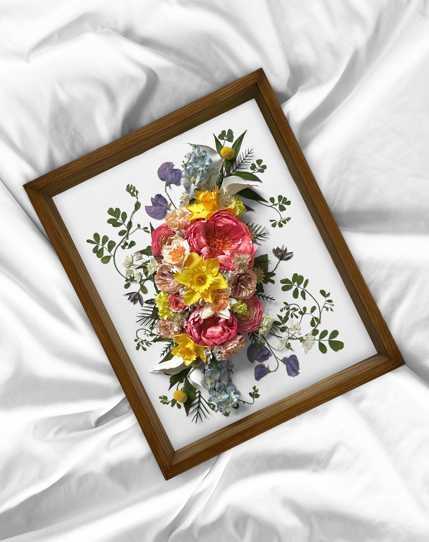 3D Wedding Bouquet Preservation Piece for Melanie
In a beautiful little moment of coincidence, I chose to share Melanie’s bouquet today—only to realize it’s her and her husband’s one-year anniversary.
Melanie (and her bouquet) were an absolute dream. I always love getting to meet my couples at drop-off—it makes the process feel that much more personal and meaningful.
Her original bouquet, designed by @strangevinestudio was filled with such stunning variety. It gave me the opportunity to create a piece that feels dynamic, full of color, and alive with movement—just like the day it was carried.
Happy Anniversary to this wonderful couple! Thank you for choosing us to create such a meaningful piece for you.
16x20 Golden Walnut
#flowerpreservation #floralpreservation #weddingbouquet #weddinginspiration #weddingphotography