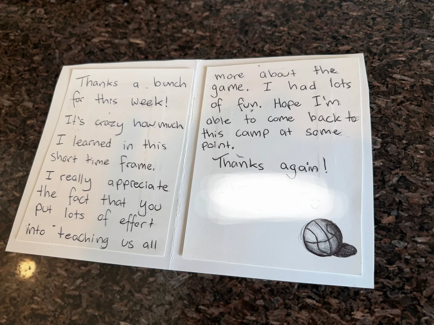 Huge thank you to the 30 campers who joined us in our Spring Break camp this year!
We were touched by this card that was gifted by a camper to our coach’s this year.
Some of our coach’s have been running basketball camps for over half their lives and these little notes are the reason why.
As we look ahead to the next camp opportunity there are still spots available for our two weeks of summer camps coming up this July!
Please visit our website for more details.
