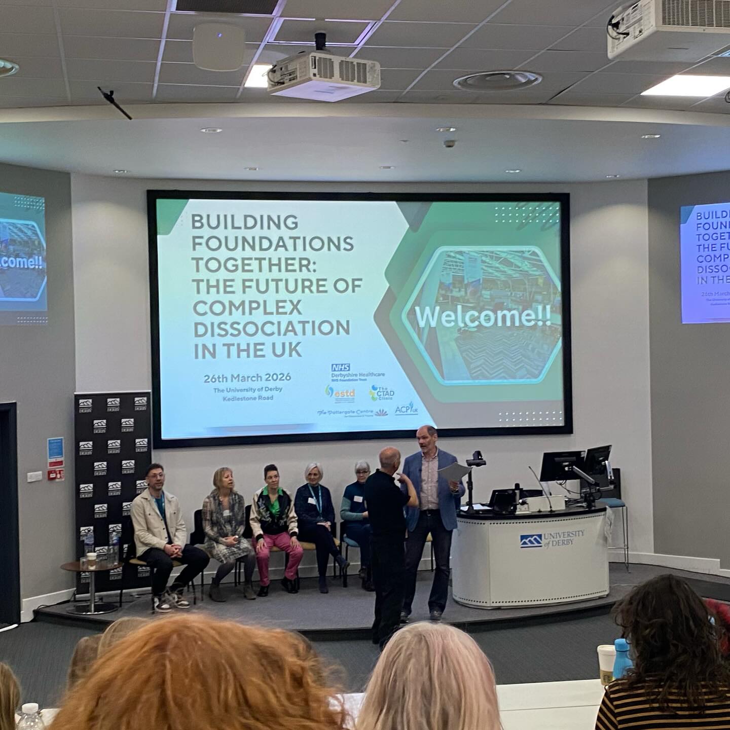 Yesterday we went to the ‘Building Foundations Together: The Future of Complex Dissociation in the UK’ conference in Derby.
Overall, we felt the messages presented were positive and hopeful for our community. We hope the information filters throughout the NHS and other services, and that this is the beginning of meaningful change for those living with complex dissociation.
For us though, the best thing was finally meeting friends we’ve known for years online! It was so good and there was a lot of “You’re a real person!” being said 😂 We also met our therapist, which was especially nice with our therapy ending in a few weeks, really lovely timing.
We were there with @theddaglobal , and it was wonderful meeting some of the people we’ve spent so much time working with, as well as having the opportunity to share the progress The DDA has been making. We displayed some of our poetry at the conference, and The DDA also managed the quiet room, providing an important supportive space for attendees. We’re also hopeful this might lead to more volunteers joining us.
Amanda and all the other presenters with lived experience were incredible advocates for all of us living with complex dissociation, thanks to all of them involved, making sure we were represented.
Also, huge thanks to you-know-who-you-are and husband for helping us get there 💖💖💖
#dissociativeidentitydisorder #complexdissociation #thedda #did #dissociation