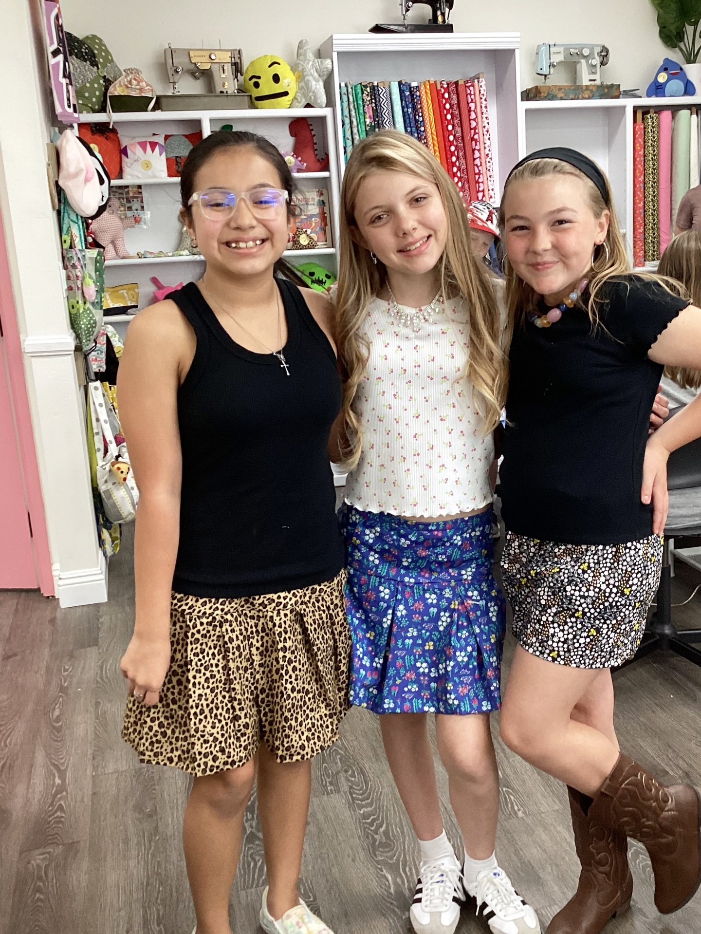 This is what confidence looks like one stitch at a time! They are ready for the warm weather with pleated skirts and summer shorts. Students at Bumblebunch are buzzing with pride.💗