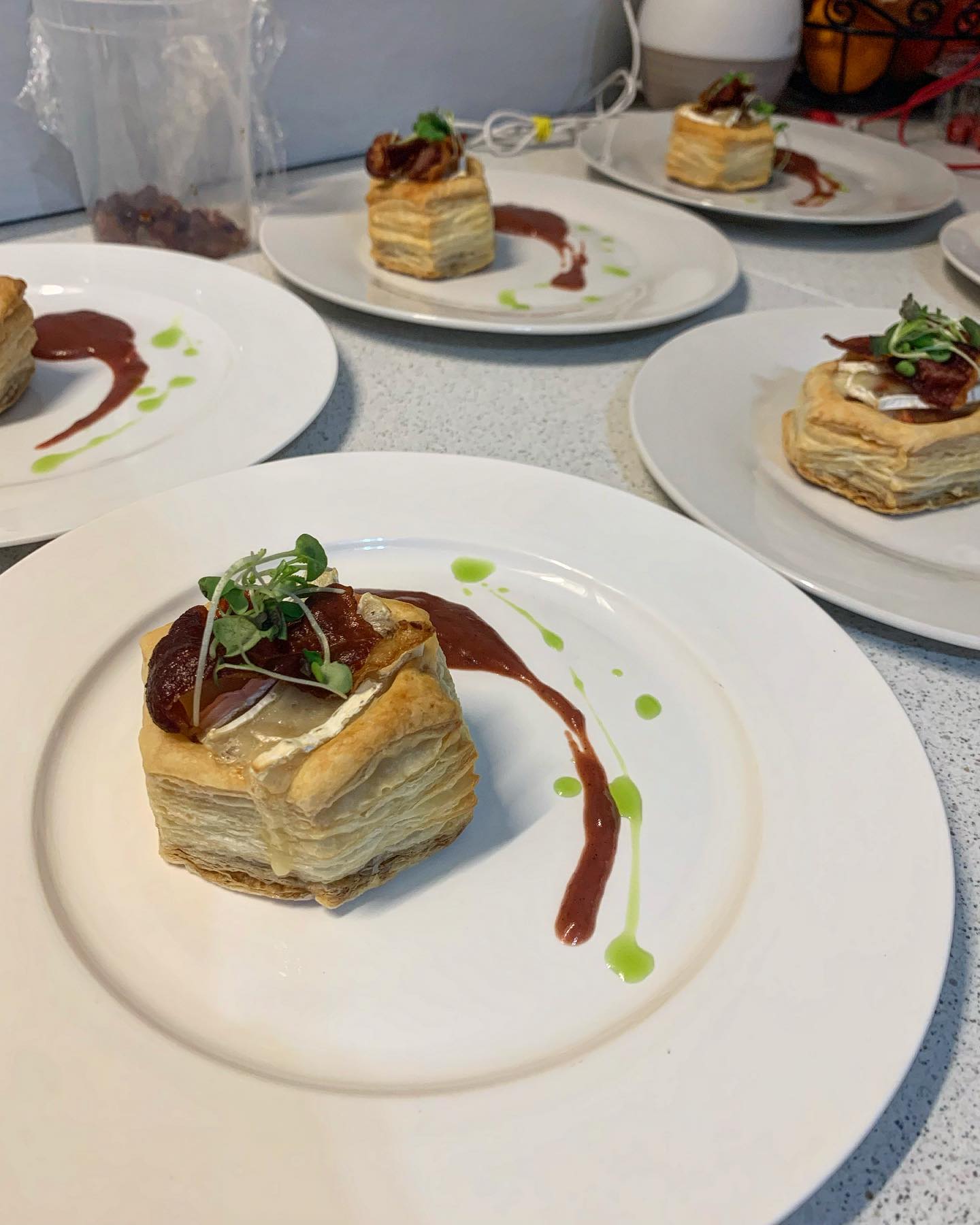 Savoury apple tart: puff pastry, caramelized apple, melted brie, deep fried prosciutto, savoury plum sauce
.
Surf & Turf: ribeye, lobster & scallop agnolotti, root veg, pommes purée, merlot demi
.
Carrot cake: cinnamon cream cheese frosting, raisin coulis, orange poached carrot, oat crumble, salted caramel