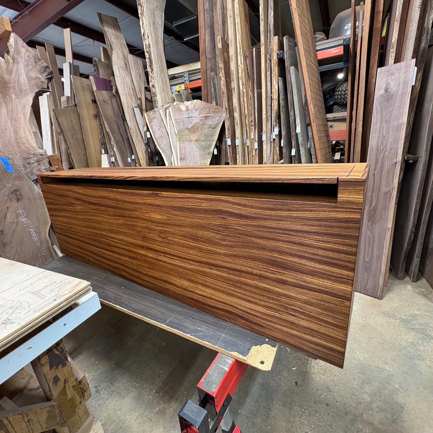 ✨ Six months ago, a husband and wife walked into Woodies looking for something truly extraordinary for their TV cabinet.
After spending over an hour exploring all the beautiful wood species we offer, they instantly fell in love with Zebrawood. The only problem? Zebrawood has become extremely rare and difficult to source in recent years.
Their carpenter had already built the plywood carcass, so we needed to wrap the entire piece in stunning Zebrawood veneer. Instead of settling for standard plywood and hoping for the best, we took a more challenging (and beautiful) route.
We re-sawed 2-inch thick Zebrawood lumber down to 5/8-inch boards, then carefully glued them together to create a seamless, book-matched, grain-matched masterpiece.
The result? An absolutely breathtaking custom Zebrawood TV console that was well worth the wait.
As they say… some things are just worth waiting for. ❤️
If you have a vision for something truly one-of-a-kind, bring it to us. We specialize in turning your ideas into bespoke furniture you’ll love for a lifetime.
Come see us at Woodies Woodshop!
#CustomFurniture #Zebrawood #Woodworking #BespokeDesign #MadeWithLove