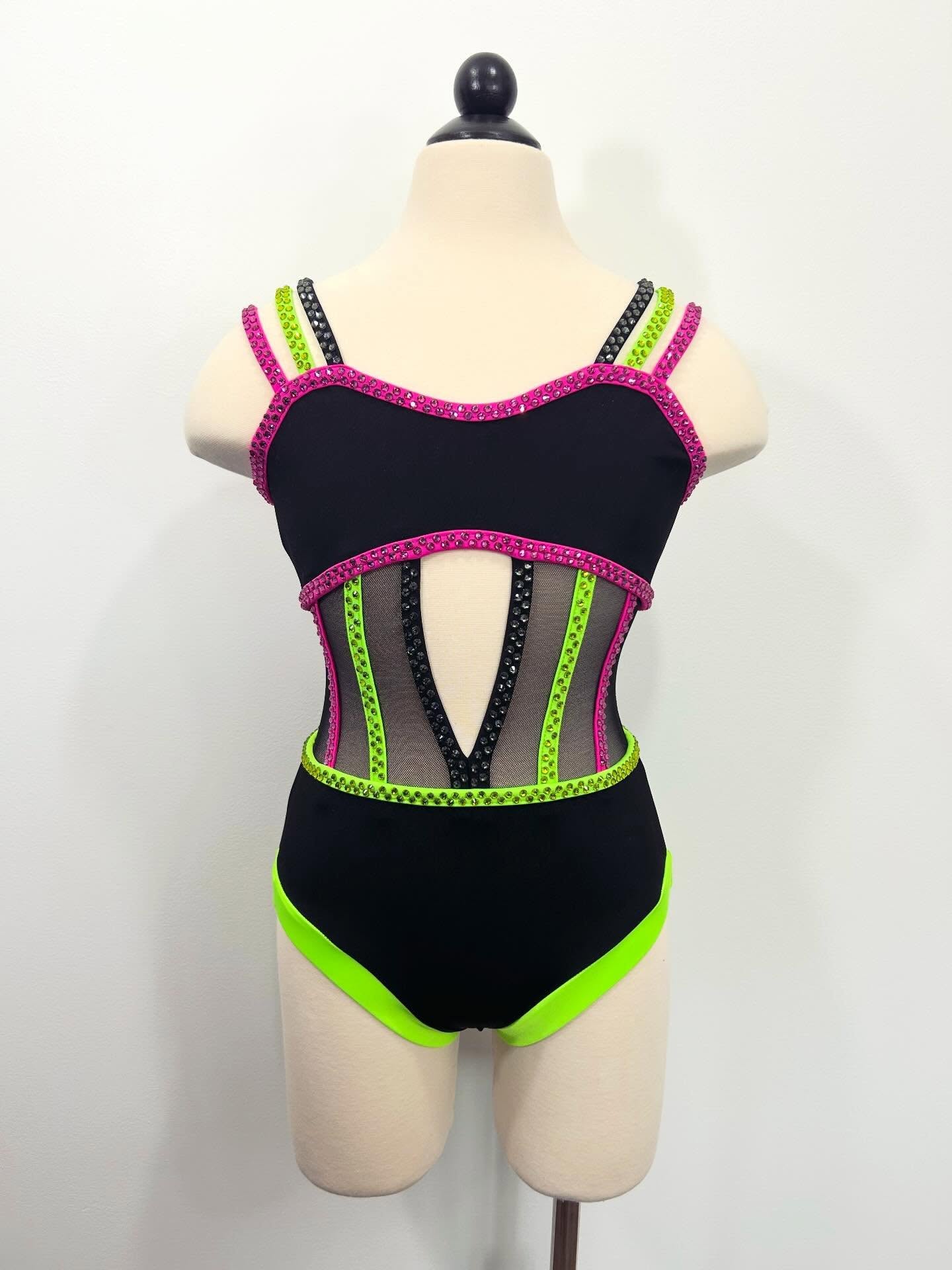 @empwrdance
Had so much fun designing an Empwr-inspired costume to display alongside my raffle box at Empwr Dance Competition this past weekend 💚💕
I’m so excited to be collaborating with them all season long - giving some very lucky dancers the chance to receive a custom costume for their 2027 dance year.
I even had some of my own students assist with design feedback on this piece to make sure it was truly dancer-approved. Being able to help dancers feel confident on stage and unlock their own power through design means so much to me, and I am grateful to be able to share that with the dance community. 🖤
Thank you and shoutout to @annsfabricshop for the help sourcing these gorgeous crystals and (as always) all of my materials!