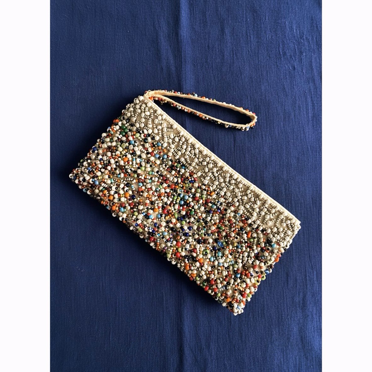I always try to find one textile/handmade item to bring home when I go on trips, but it was hard in the resort town of Punta Cana, which really just caters to tchotchkes…. but finally found this cute little hand beaded wristlet, now I’m inspired to make one…