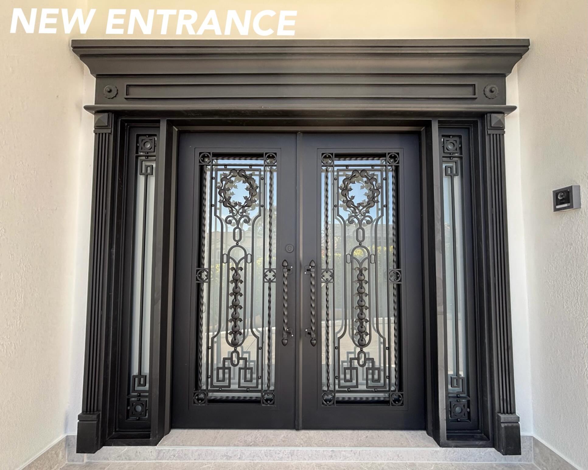 Our last post received great response on a Timber Door to Iron Door example.
In this post, we present the following two projects/posts side by side — both Timber to Iron Doors featuring a similar pattern and custom iron architraves, with the major difference being a wide opening rather than a tall opening.
Both posts: A New look with a taller visual appearance.
Special Features of this Door: Custom Long Handles, finished in Matt Black w. Frosted Toughened Glass(operable).