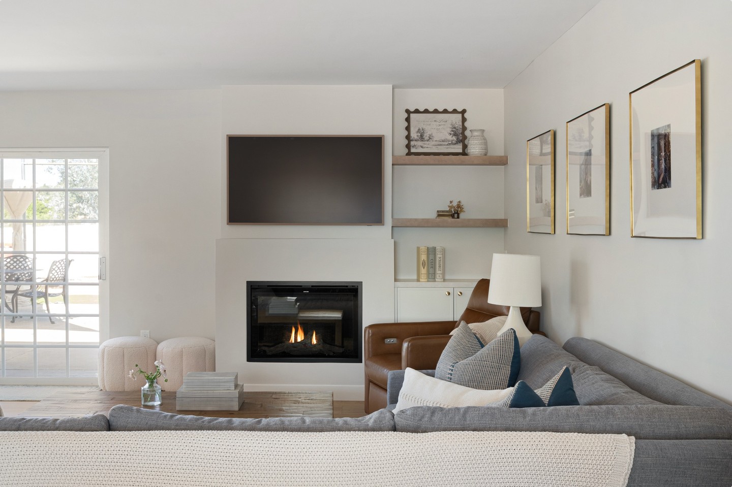 Before and After:
This space may look familiar but a few key changes made a big difference.
We reworked the doorways and hallways to allow for a more functional layout, bringing the sofa closer to the TV and creating a more comfortable space to gather.
Before, the seating was spread across two separate areas, making it difficult for the family to enjoy the space together.
It’s often the small layout changes that make the biggest impact. SWIPE FOR THE BEFORE!