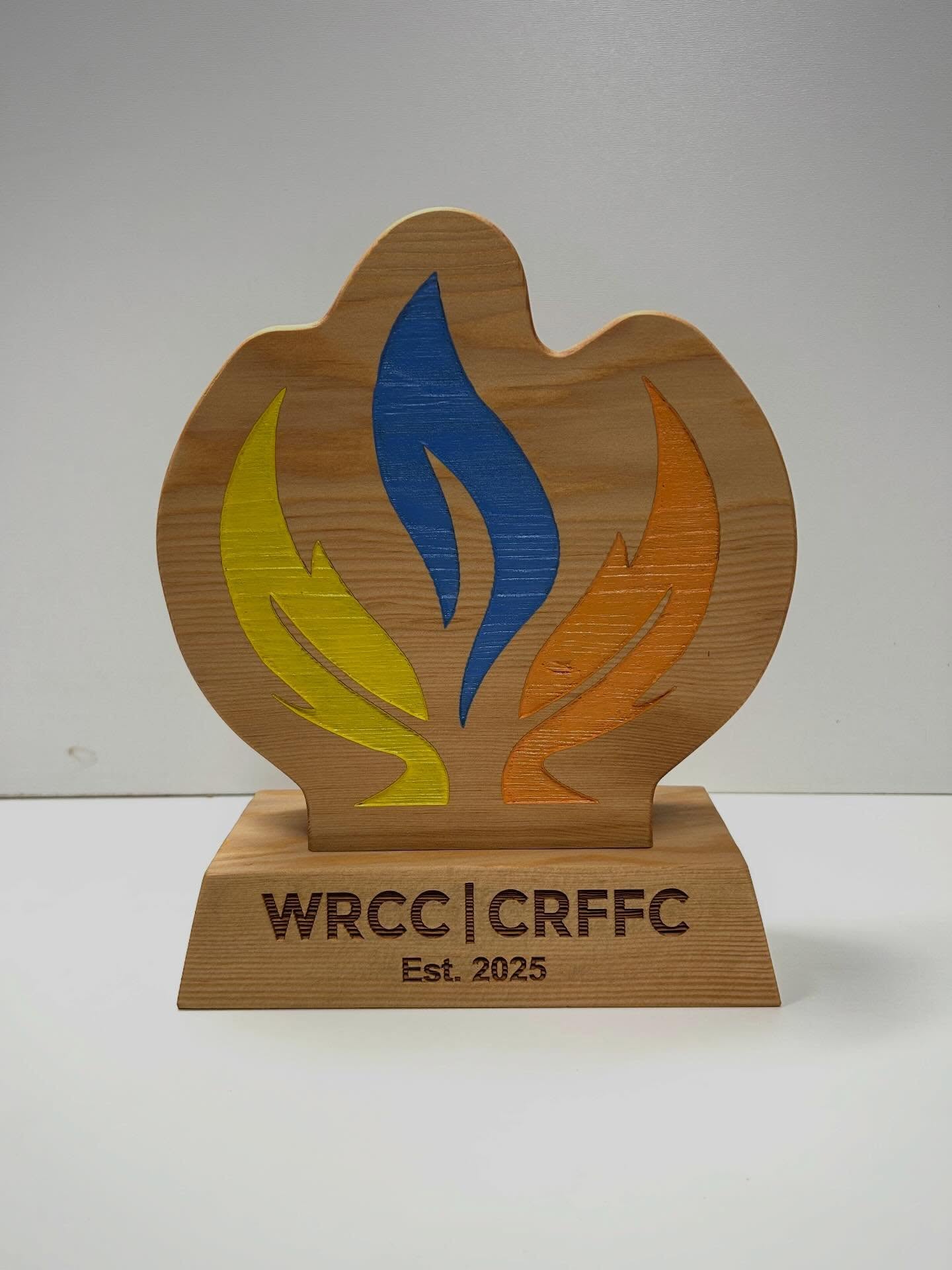Custom award made from reclaimed Douglas fir with deep etch and painted logo for WRCC (wildfire resilience consortium of canada)