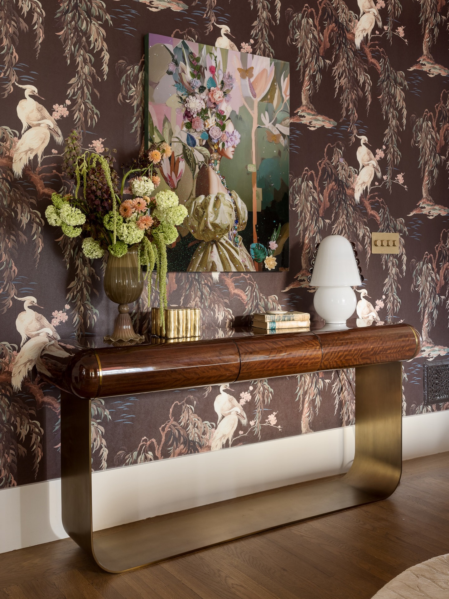 A study in form and balance.
The Axis console by @mousstudio anchors the room with its sculptural silhouette - where rich wood grain meets a fluid brass base in a gesture that feels both grounded and effortlessly chic.
Set against a romantic backdrop of chinoiserie-inspired wallcovering, the piece becomes a special focal point - layered with florals, art, and collected objects that echo the spirit of Birds of a Feather: a space shaped by connection, craftsmanship, and thoughtful composition.
Design: @sonomainteriors
Photography: @tim.d.coy.photography
Stylist: @lucybamman
Build: @dotto_company
Console Table: @mousstudio @colemanandrose
Florals: @mflora.design
Vessel: @inkandporcelain
Gold Box: @anyonatelier @anastasiohome
Art: @chloegallerysanfrancisco @amyshekhter
Lighting: @thefutureperfect @incommonwith
Architectural Lighting: @corston.us
Wallpaper: @houseofhackney
Wallpaper Installation: @wallpaper_perfection_ca
Rug: @casacitarugs @therugfinder
.
.
.
.
#birdsofafeather #SFDecoratorShowcase
#sonomainteriors #sculpturaldesign #modernvictorian