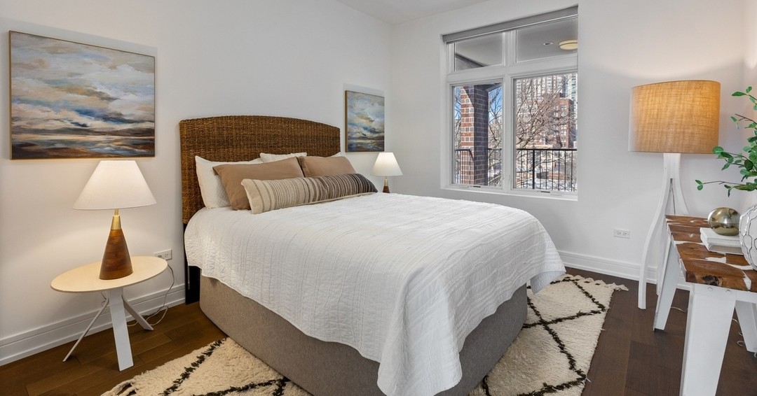 A cozy and zen bedroom with layered neutrals and wood tones 😴 #zen #cozy #bedroom #chicago #chicagorealestate #havenhomestager #chicagohomestaging #stagingworks #stagingsells #staging #homestaging