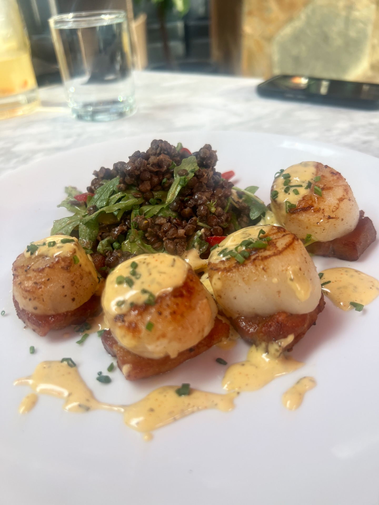 Seared scallops.
Crispy pork belly.
Finished with béarnaise.
French green lentils.
Arugula for a little bite.
Rich. Balanced. Built to linger.
Join us at C. Knight’s Steakhouse.
@edhtowncenter
#CKnightsSteakhouse #DinnerDoneRight #EDHTownCenter