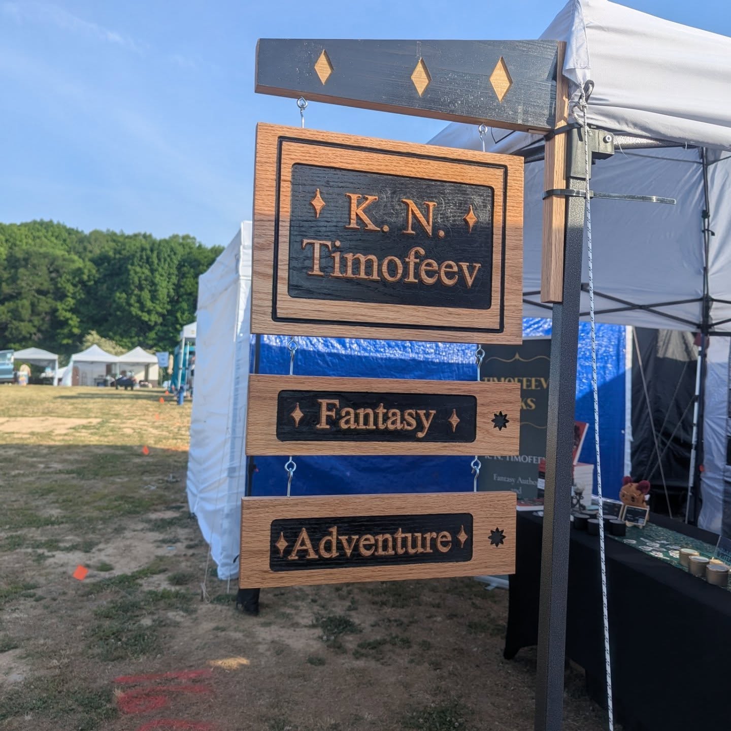 All set up for day one of @festivaloflegends This is my first year as a vendor after years of being a patron. Don't forget to ask about how to earn a 15% discount. #indieauthor #fantasybooks #highfantasybooks #lgbtqcharacters🏳️🌈