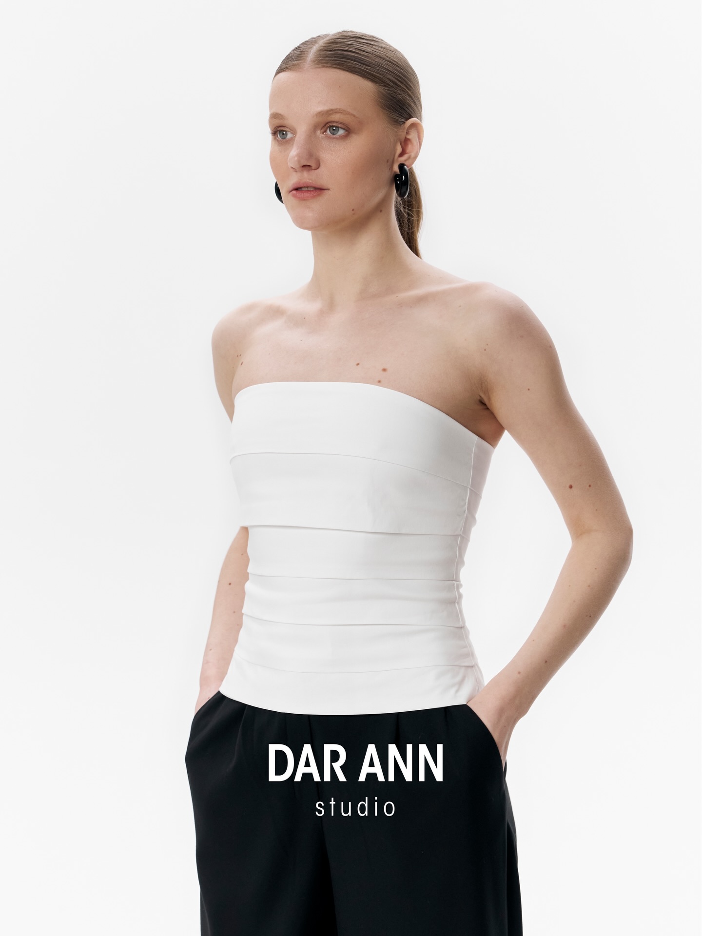 Sharp architectural layered lines meet a perfect body-hugging silhouette. Discover our new BORDERLINE Top at www.darann.com ⚡