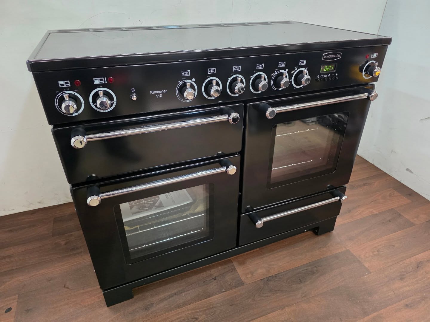 Available now!
Rangemaster Kitchener 110cm KCH110ECBL/C All Electric Ceramic Halogen Range Cooker
Colour: Black & Chrome
Condition: Brand New
Specifications:
- 6x Ceramic Halogen Hob Zones (Smooth Top)
- 1x Dual Zone Grill with Glide out Grill Pan (Top Left)
- 1x Fan Assisted Oven (Left)
- 1x Fan Assisted Oven (Right)
- 1x Storage compartment/plate warmer (Bottom Right)
- 2x Oven Lights
- Programmable Timer
- Users Manual
Brand New and never used. Still has the packaging inside the ovens and on the handles. Only tested and took photos.
**FULLY WORKING and TESTED**
A rare opportunity to purchase this brand new Rangemaster for a massively discounted price!
Dimensions:
Width: 1100mm
Depth: 600mm
Height: 900mm (height adjustable)
**All pictures are of the actual item**
12 Months Warranty
Free UK Delivery
Experts in overseas shipping
All our cookers are in stock and are ready for Collection or Delivery
Installation available
Viewings welcome
Collection welcome
Payments Accepted: All Credit & Debit Cards, Cash, Paypal, AMEX, Ebay or Bank Transfer.
For all other payment methods please contact us
©️ Lancashire Cookers 2008