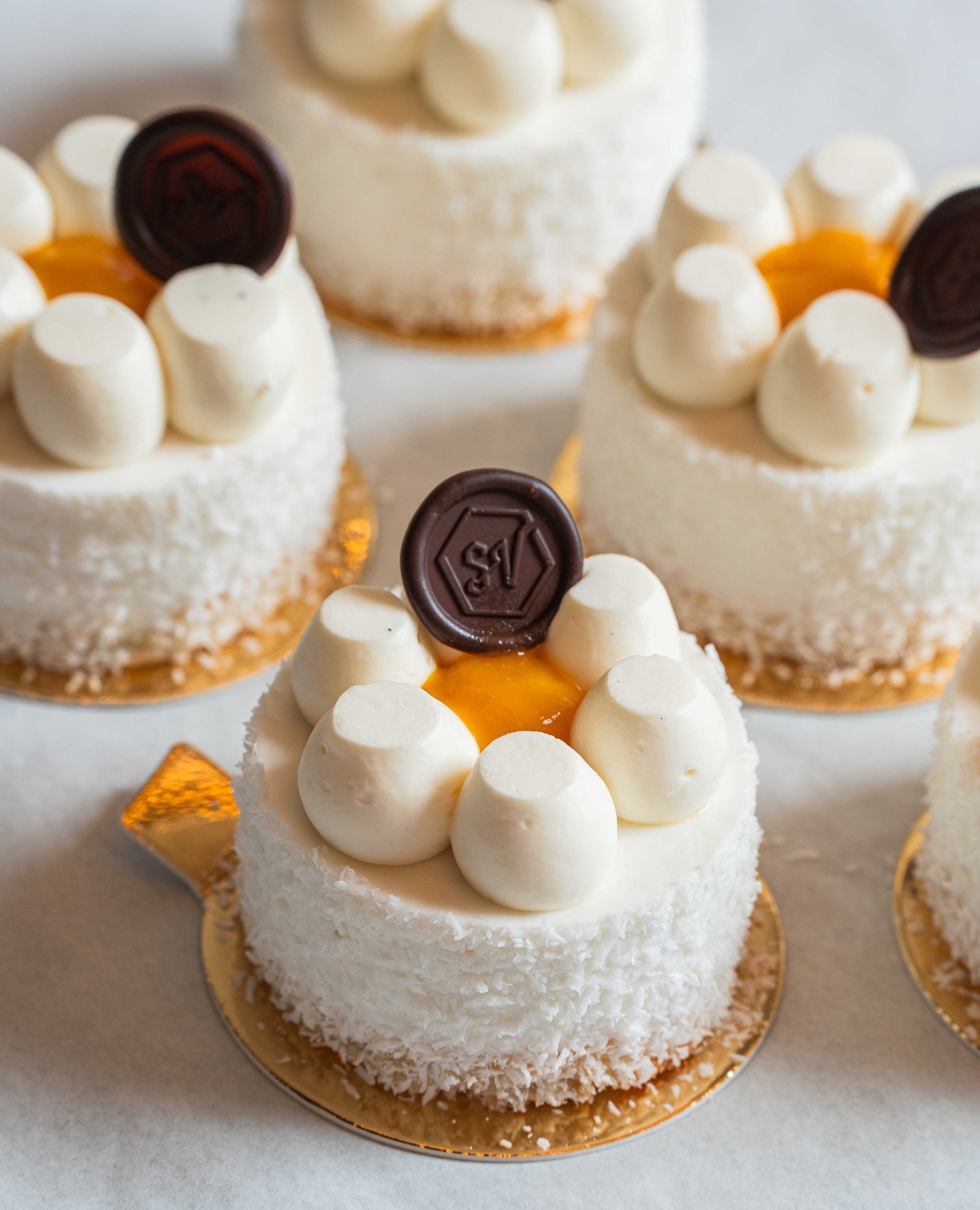 The newest addition to our seasonal desserts is our Mango Coconut Cake.
It features almond coconut sponge cake layered with mango curd, coconut mousse, and mango jelly, topped with mango confit.
It is also gluten friendly!
#SVBakery #SmallVictoryBakery #Mango #Coconut #Dessert