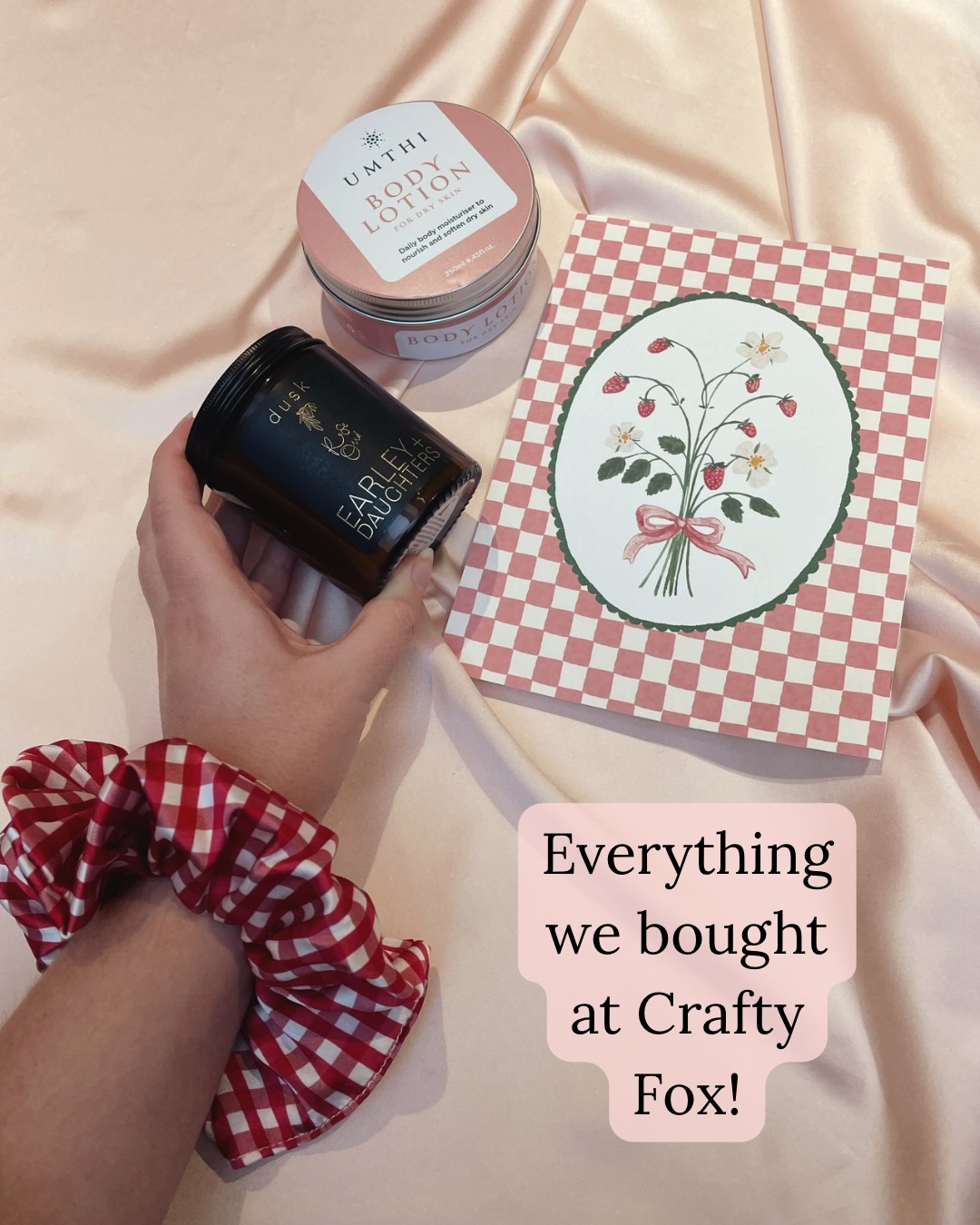 Everything we bought at Crafty Fox!
We love buying a few things for ourselves at markets and @craftyfoxmarket earlier this month was no different. The range and curation of brands was amazing and honestly inspiring to be amongst.
My table was next to Hermine Doublon and I already had my eye on this print and once we were there, I couldn’t resist!
I shortlisted three candles from Earley and Daughter for Raff to go along later and choose one. He chose Dusk which has top notes of rose and peony which are two of my favourite flowers.
This Umthi body lotion was another bookmarked purchase for Raff to go and check out later! I wish you could smell through the screen!
Have you visited a craft market or makers’ event recently and found any new favourites?
Image description- 1, 2 and 6. a flat lay with a body lotion tin and strawberry art print on a pink silk background. A hand with red gingham scrunchie on the wrist holds a glass candle jar
3. The strawberry print held by a hand wearing a red gingham print silk scrunchie
4. The candle next to a navy silk eye mask with white star and moon print
5. The body lotion tin held by a hand wearing a white silk scrunchie
All images have text from the above caption added