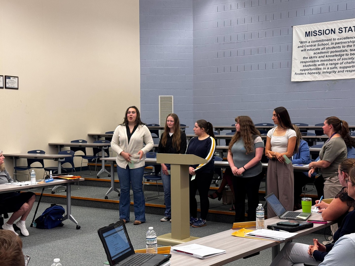 Running Start participants are making real impact in their communities!
This week, Addison Lendt, Emma DeGolier, Kaylee DeGolier, Savannah Frudd, and Meredith Lendt from Westfield, New York presented their 1st Amendment 1st Vote community action project to their Board of Education.
The group organized health and wellness initiatives at their school, including a hygiene closet and health and wellness day for middle and high school students. The team created a more comfortable and open environment to talk about mental health at their school.