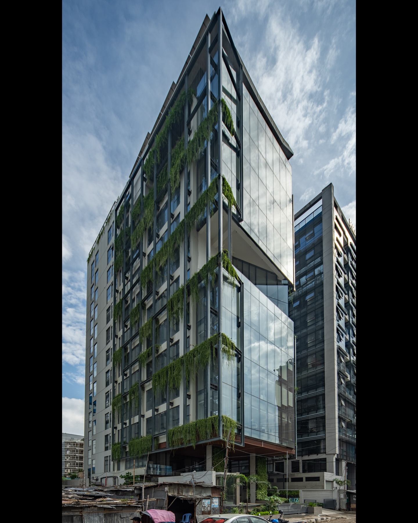 Shot in 2024 — a closer look at CEGIS Bhaban, Agargaon.
Designed by Praxis Architects Ltd under Ar. Nazli Hussain, this 13-story Net Zero commercial building stands as a benchmark for sustainable architecture in Bangladesh. Completed in December 2023, its 75,000 sft footprint reflects a thoughtful balance of design, efficiency, and environmental responsibility.
From façade to function, every detail speaks of a future-forward approach to building.