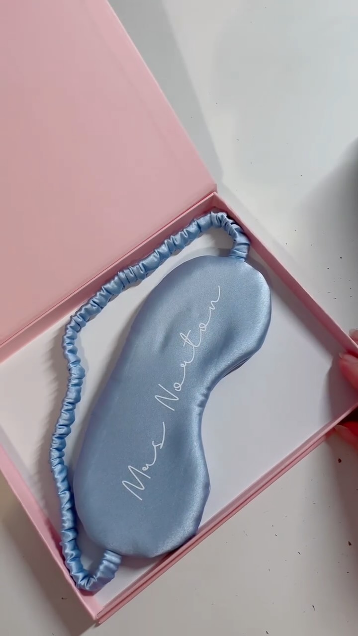 I love making my personalised eye masks but this was a really special one for me to make last year because it was for my sister in law!
It was a bit odd writing Mrs Norton as I had only ever written Miss Norton before I got married
Video description- Clips of a pale blue eye mask being cut and sewn, ironed and hand stitched closed before a Cricut cuts out white vinyl to add the words Mrs Norton to the eye mask. The video ends with the eye mask in a gift box
