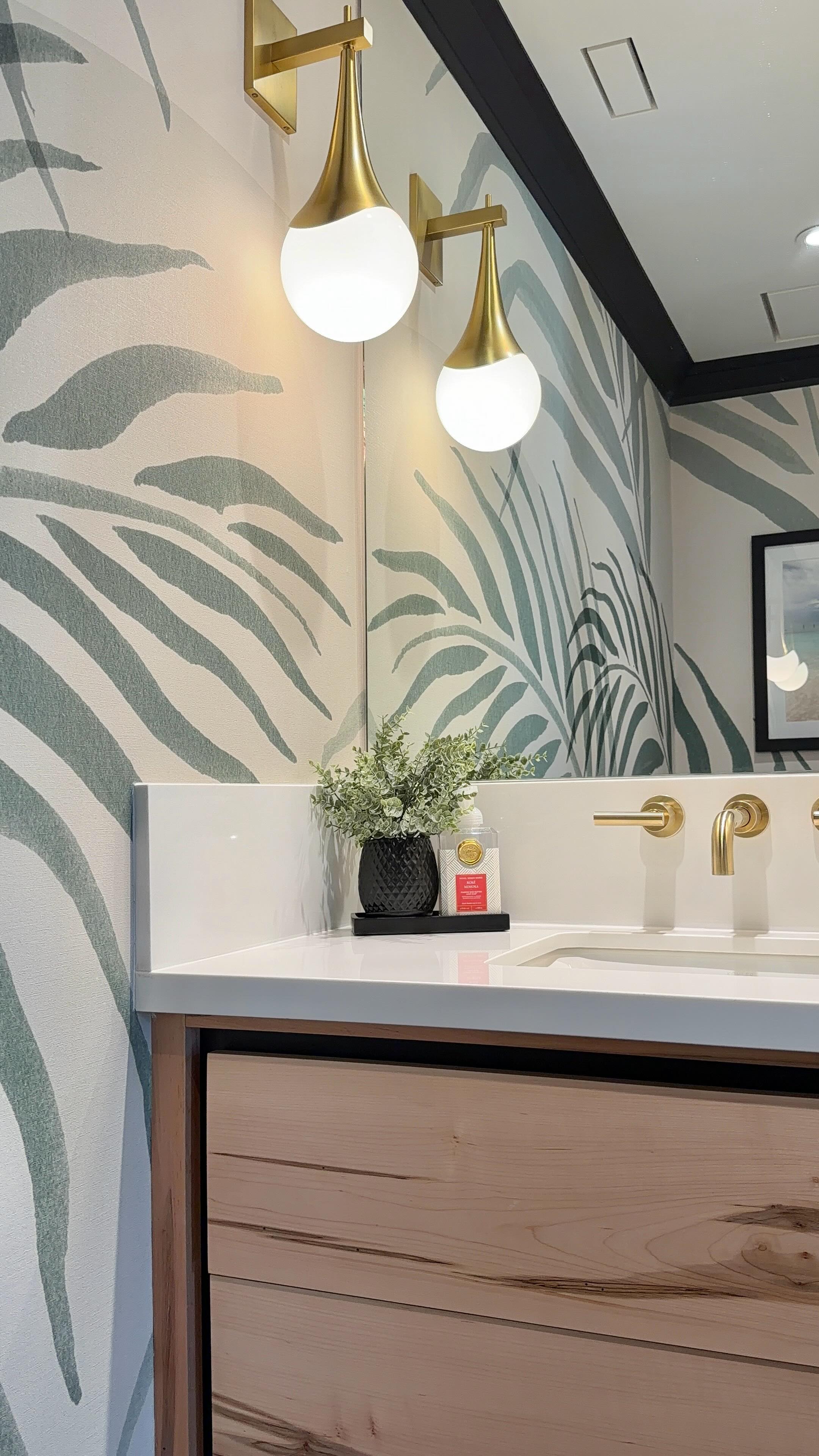 Small space, thoughtfully done.
From the statement wallpaper to the custom vanity, every detail was designed to feel intentional. 🌿
#powderroom #interiordesign #vanity #details #cabinetry