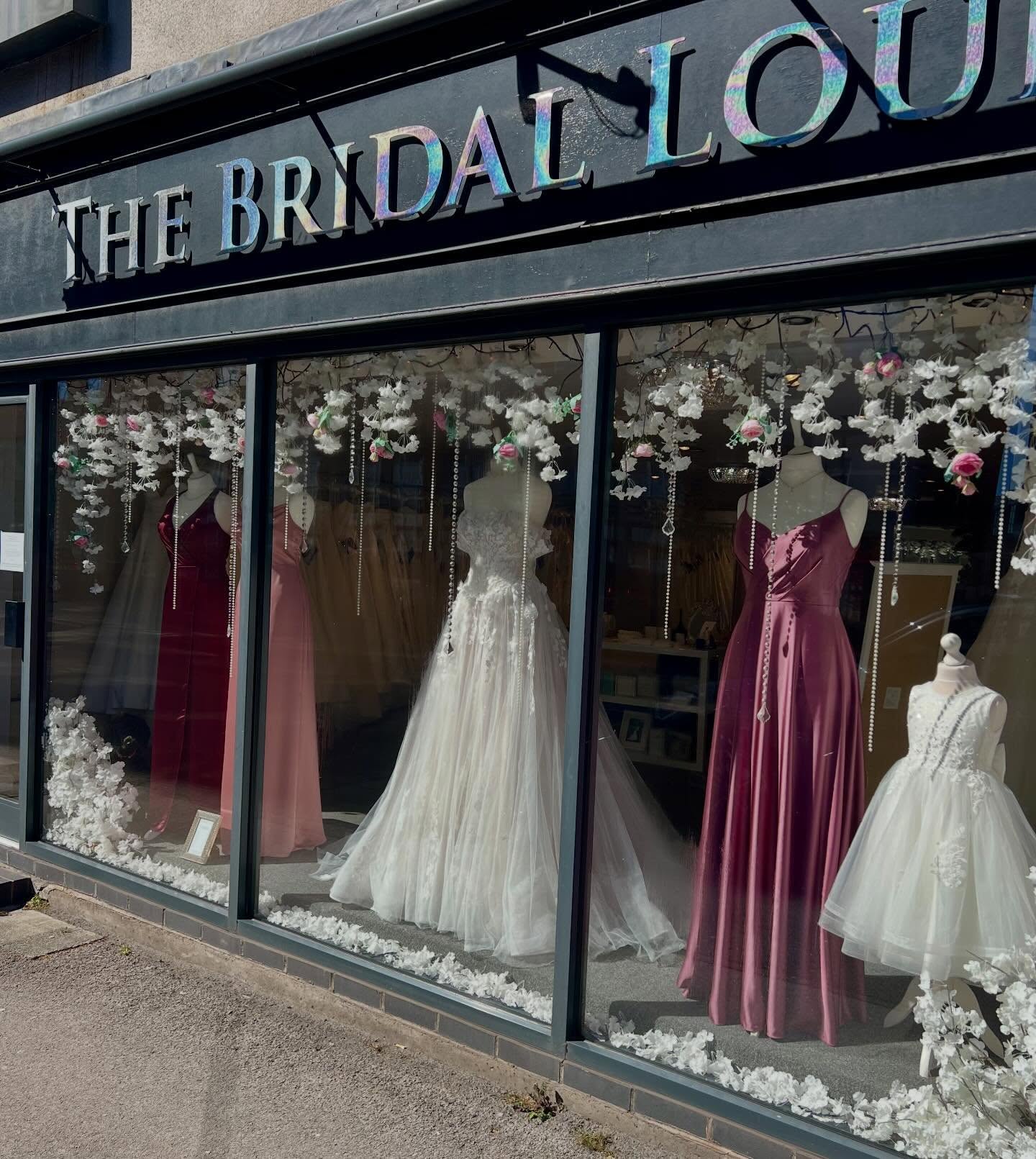 Today’s window change features gorgeous bridesmaids dresses from Sorella Vita in shades of Deep Ruby, Bellini and Rustic Rose charmeuse satin and one of our favourite gowns from @essenseofaustralia, Harper, in the biscotti/ivory colourway. Harper has pretty off the shoulder straps which are detachable, stunning lace appliqués with 3d flowers and sparkle tulle 🩷
Spot our little visitor in the window too … Blair my baby dog 🐕🦺
Book your appointment with us today xxx
#thebridalloungenewcastleunderlyme #essenseofaustralia #sorellavita #weddingshopping #bridalshop
