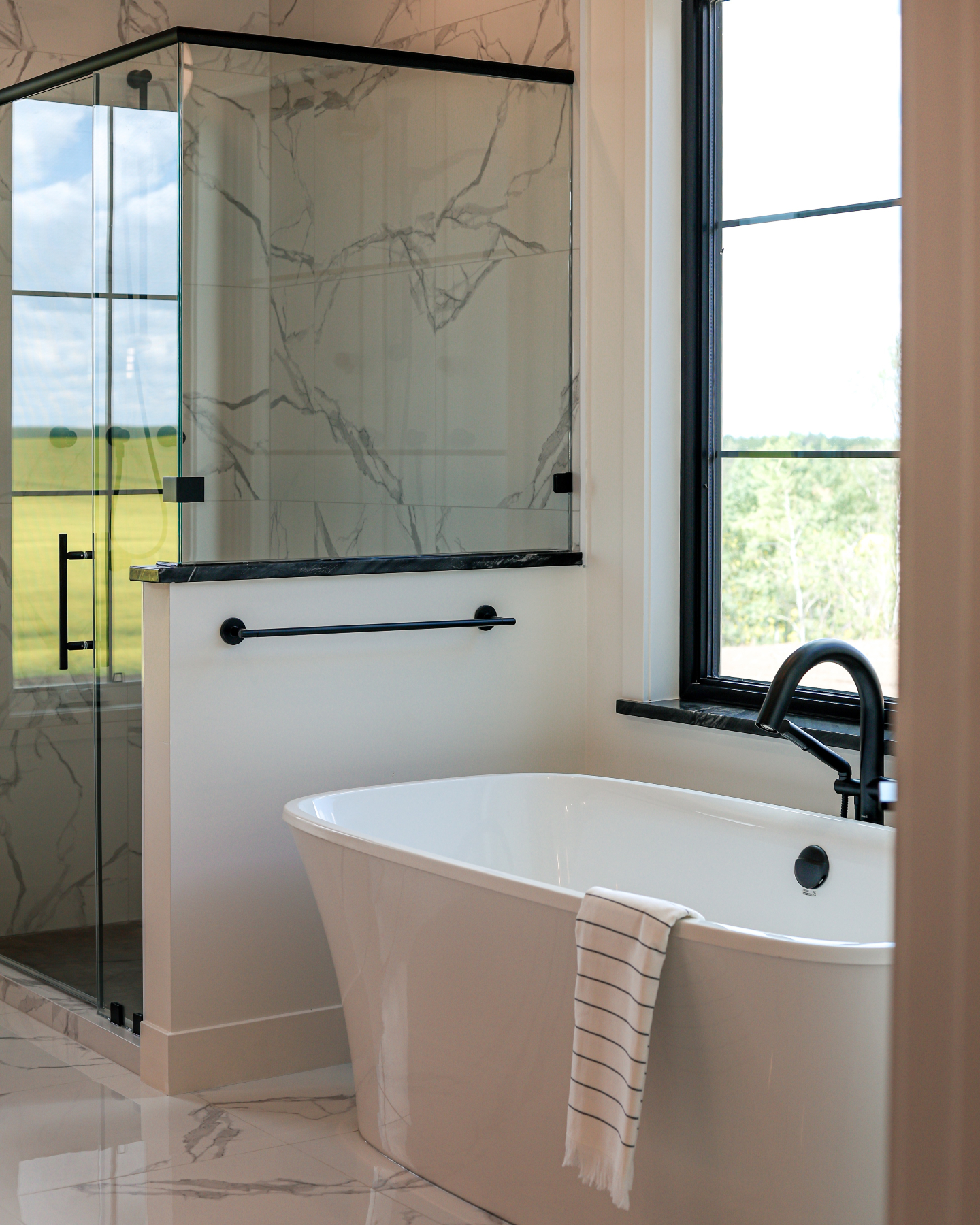 Timeless finishes are just something else 😍
A bathroom like this is hard to forget. From the floor-to-ceiling marble to the matching prairie view, it’s a space you’ll never want to leave.
@accentlightinglloydminster @power_pro_lloyd @windsorplywood_lloydminster @lpsmartside @luxwindows
#TrestleRiverHomes #DreamHomes #DreamBathroom #BathroomInspo #FloortoCeilingMarble