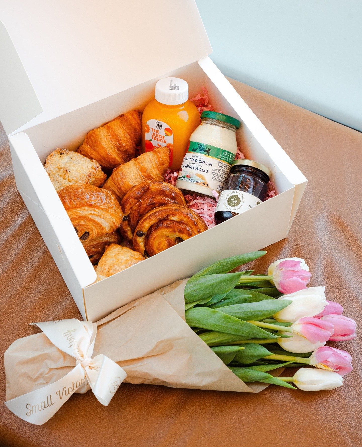 Mother’s Day Breakfast in Bed Box.
Bring mom a box of goodies to start her day feeling loved and cared for.
Selection of SV mini classics: pain au chocolat, croissant, pain aux raisin, classic scone and lemon cranberry pistachio scone.
Paired with English clotted cream, Le Meadows Pantry jam and cold pressed OJ.
Option to add on a petit bottle of prosecco. Because why not!
Link in bio to pre-order now.
#SVBakery #SmallVictoryBakery #MothersDay
