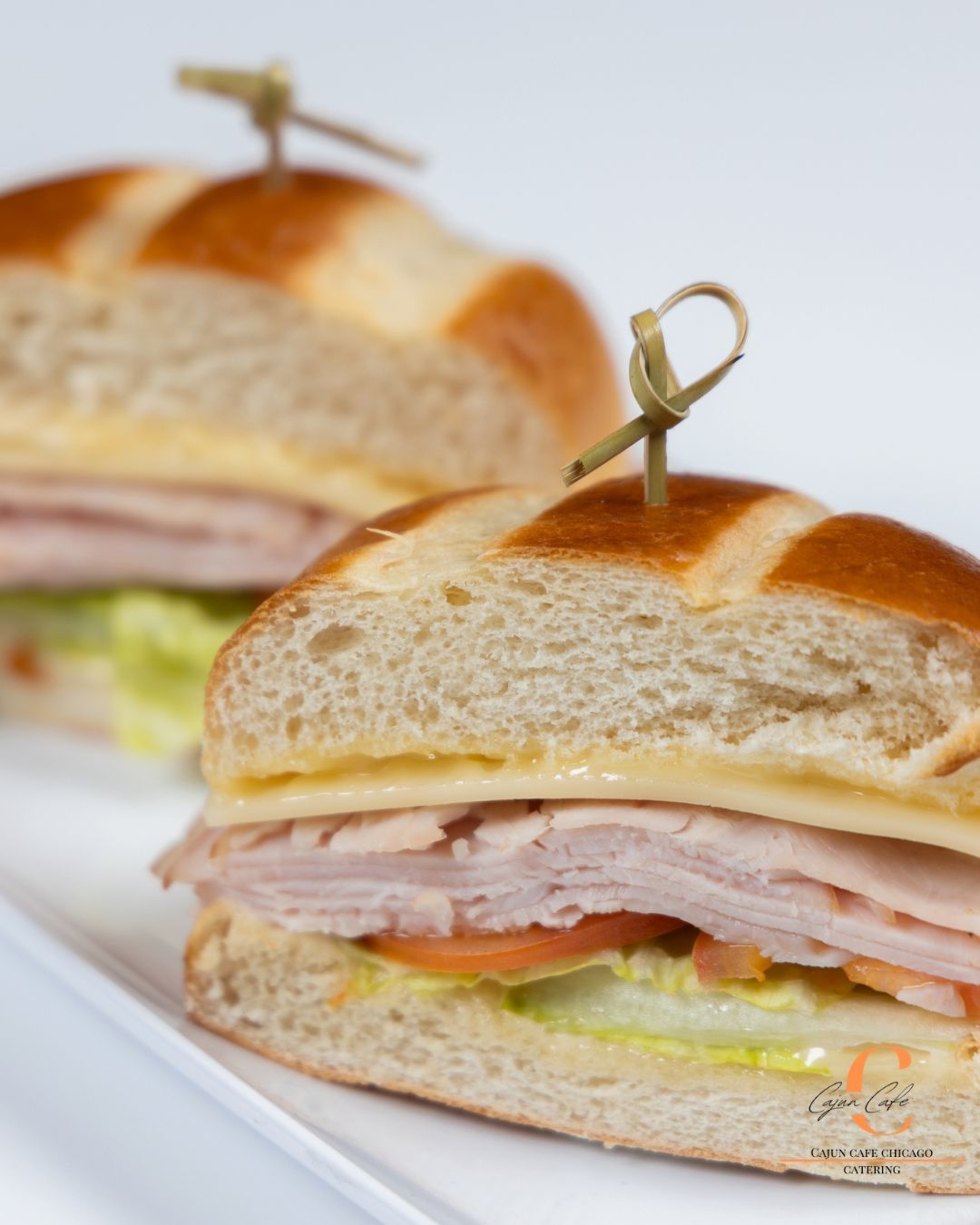 Our classic turkey is one of the top sellers for our boxed lunch options.
Fresh baked bread, crisp lettuce, tomatoes, provolone cheese, and shaved turkey finished with a honey dijon spread.
#CajunCafeChicago #CorporateCatering #BoxedLunch #ChicagoCatering #OfficeLunch