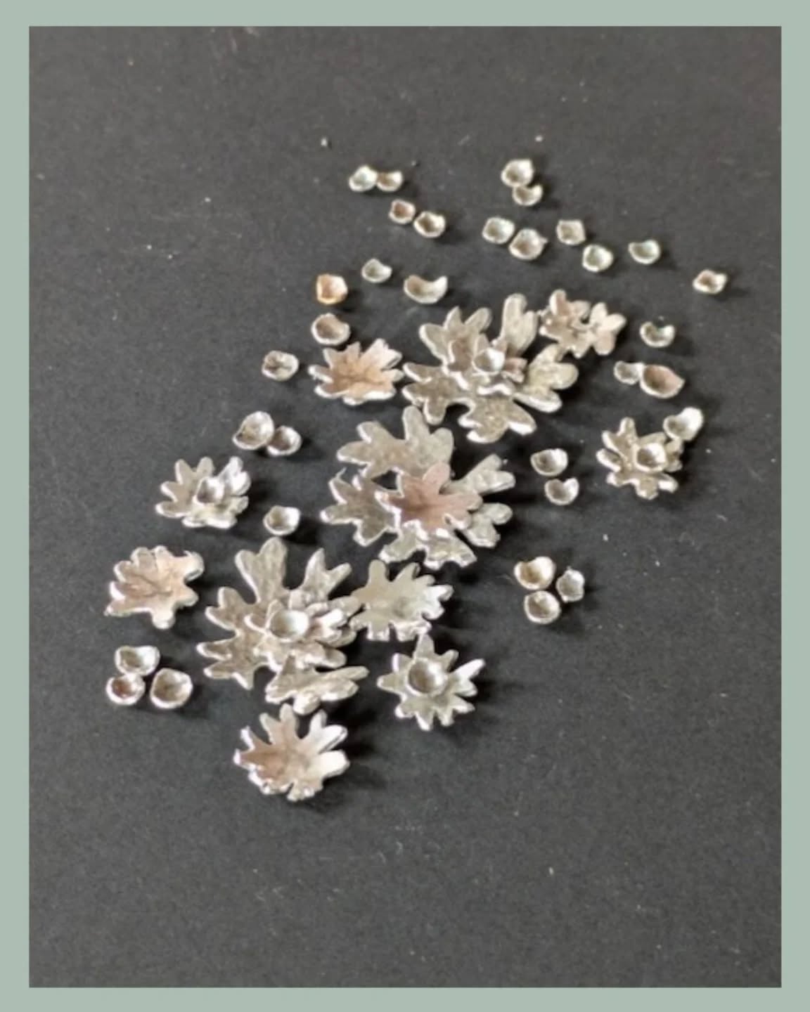 My new lichen pieces are slowly progressing. At the moment I'm cutting out lots and lots of lichen shapes in various sizes. It's quite fiddly and I seem to spend a lot of time dropping them and then searching for them on the floor. 😊